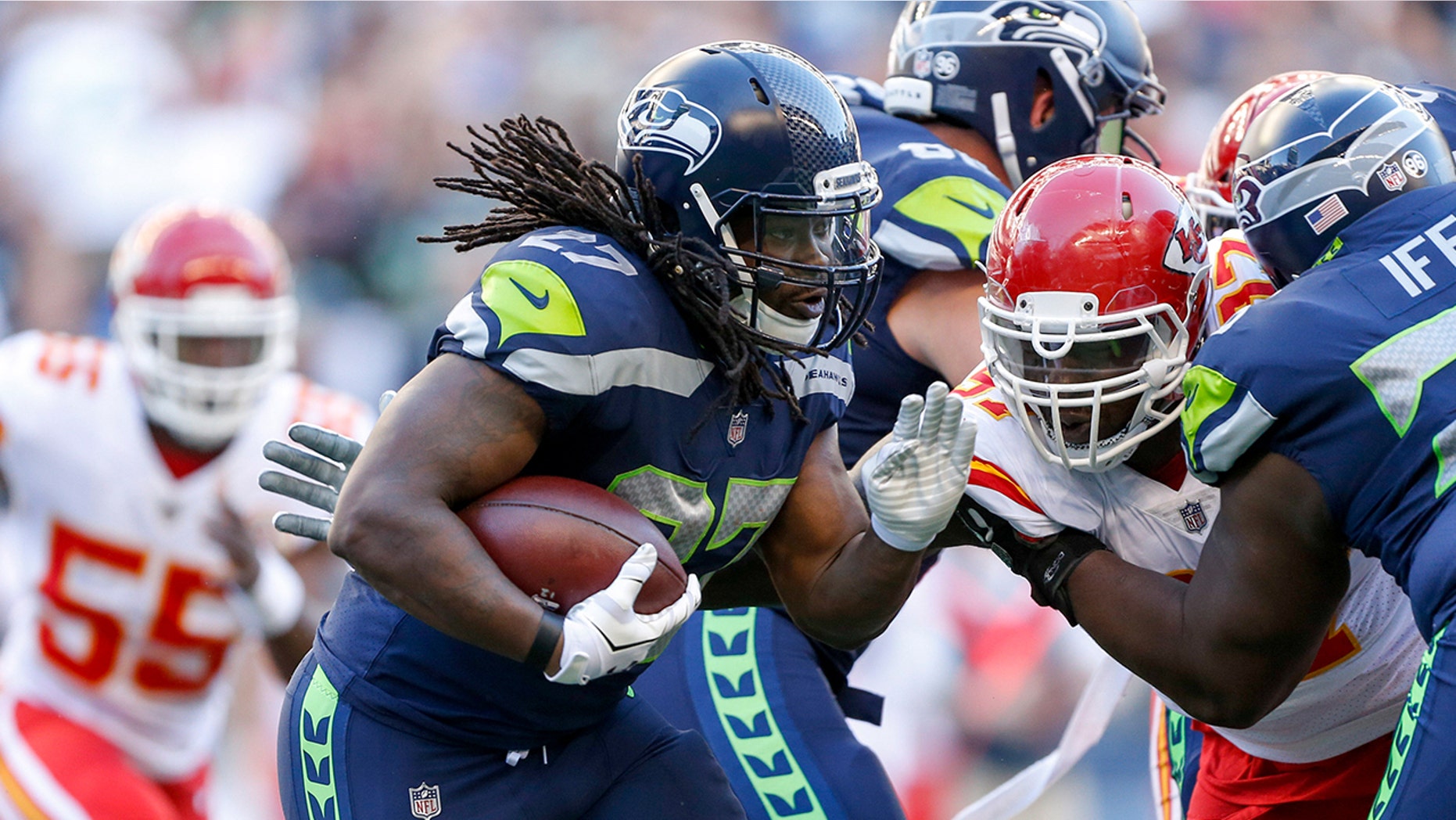 Seattle Seahawks running back Eddie Lacy (27) rushes against the Kansas City Chiefs the first quarter at CenturyLink Field on August 25, 2017.