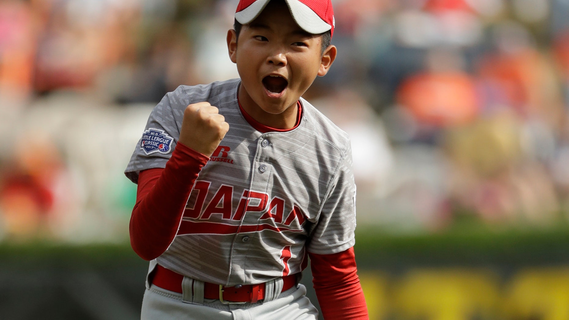 Aug. 27: Japan's Tsubasa Tomii celebrates an out during the Little League World Series Championship baseball game against Lufkin, Texas, in Pa.