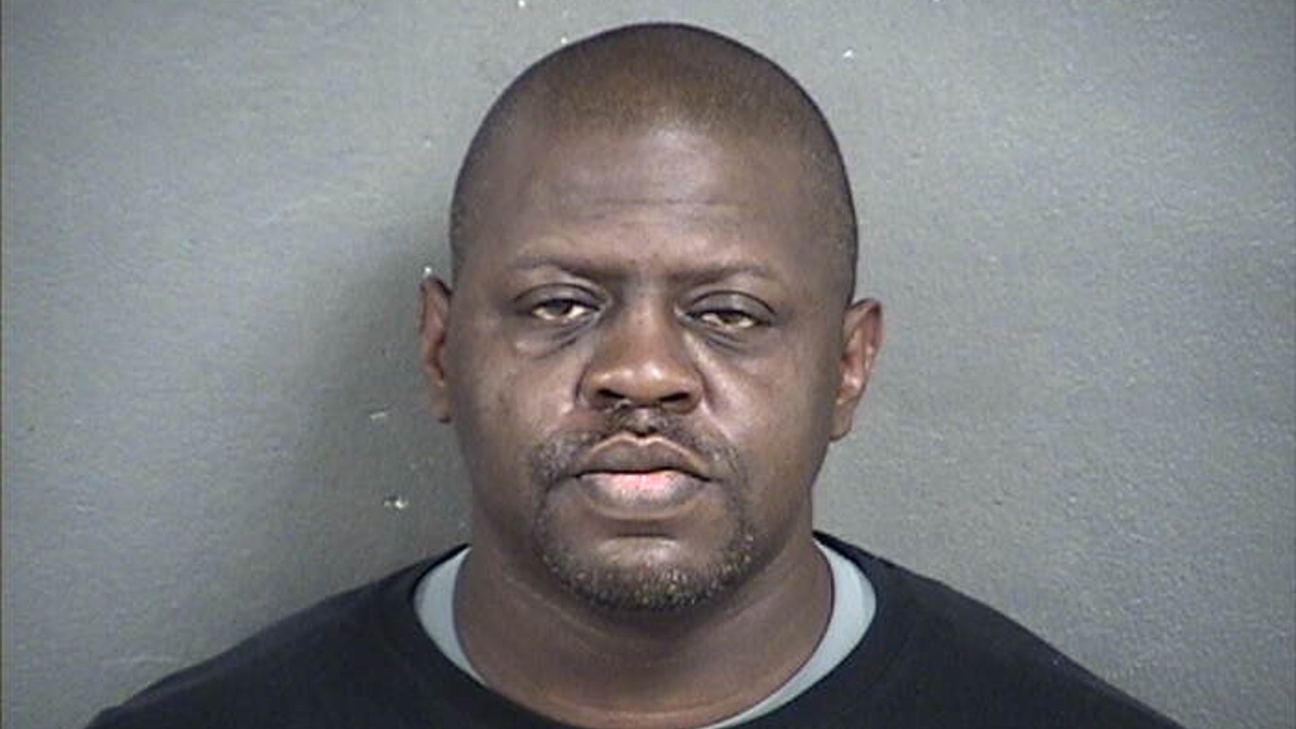 FILE - This undated file photo provided by the Wyandotte County Detention Center shows Michael Jones. The Kansas man will be sentenced to life in prison Monday, May 8, 2017, for the killing of his 7-year-old son, who authorities say was subjected to horrific abuse and was "essentially starved to death" before his remains were found in the family's pig sty. (Wyandotte County Detention Center via AP, File)