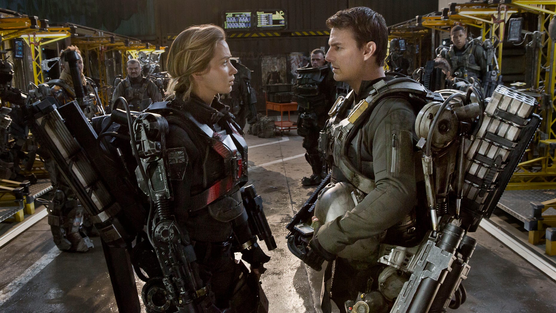 This image released by Warner Bros. Pictures shows Emily Blunt, left, and Tom Cruise in a scene from "Edge of Tomorrow."
