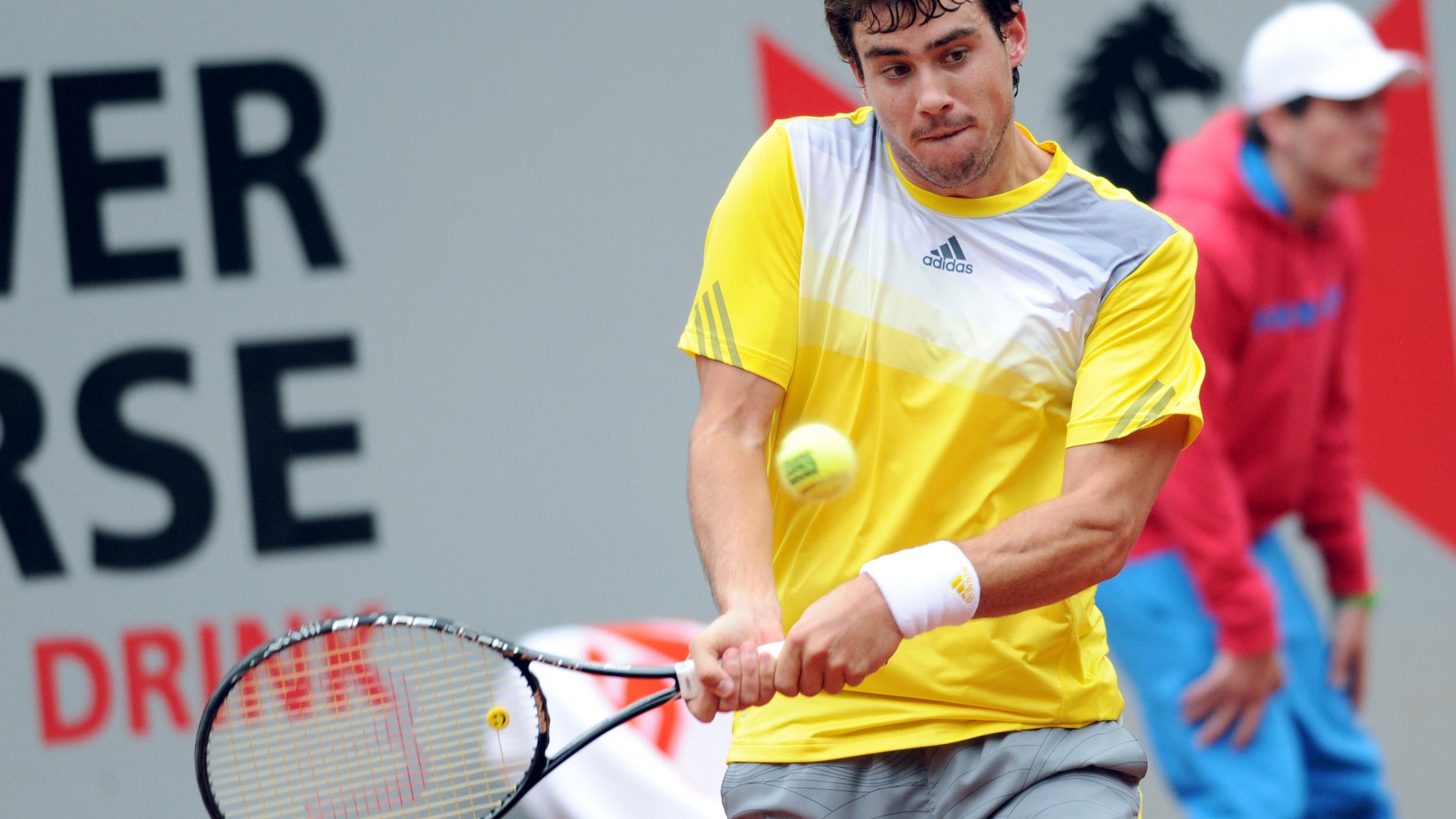 Argentine's Guido Pella returns a shot to Serbia's Janko Tipsarevic during their tennis match at the Power Horse Cup in Duesseldorf, Germany, Wednesday, May 22, 2013. Pella, a qualifier, defeated top seeded Tipsarevic with 7-6 and 6-1. (AP Photo/dpa, Caroline Seidel)