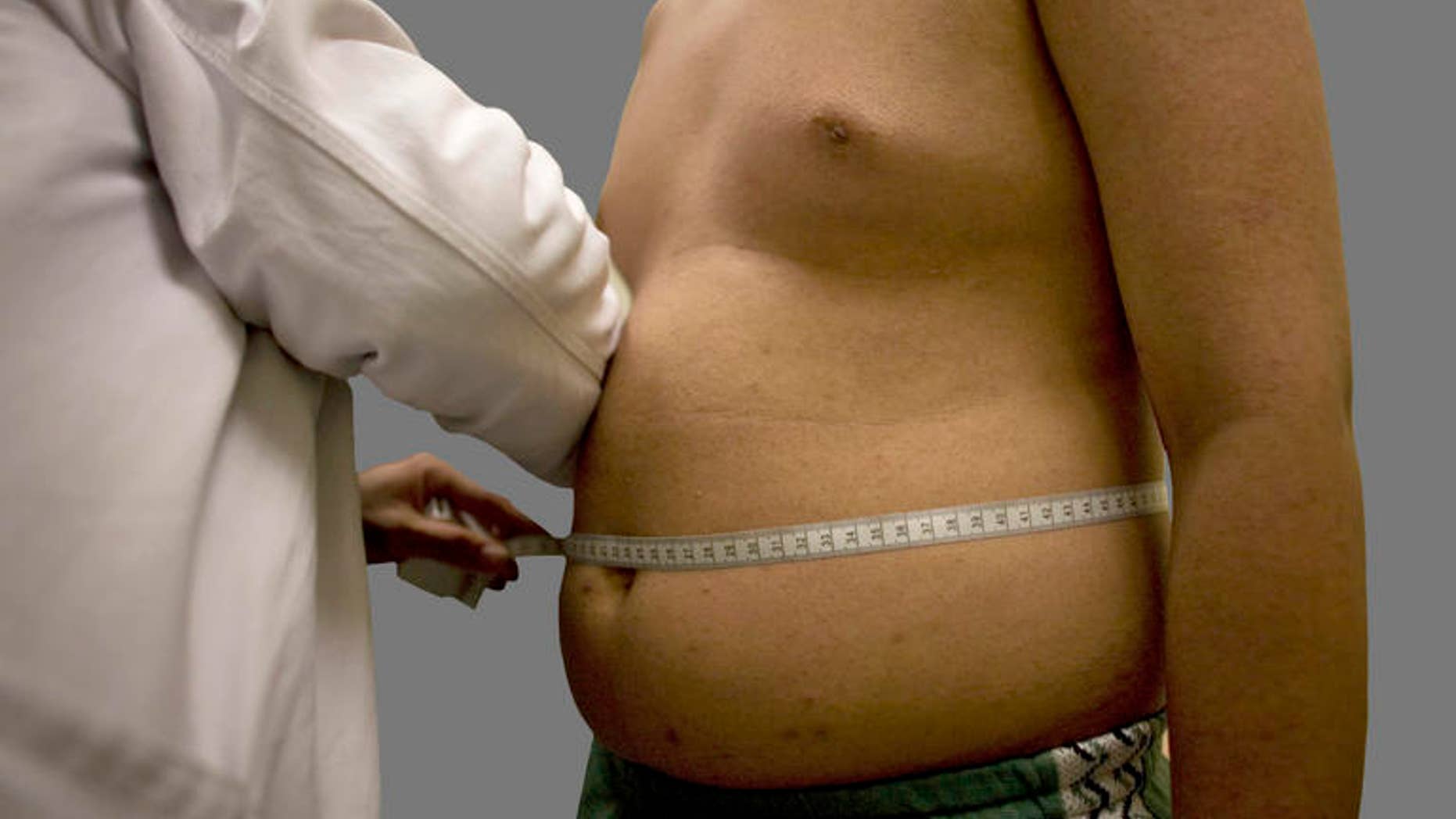 ** ADVANCE FOR SUNDAY, SEPT. 28 ** Angel Moreno, 14, who weighs 71.5 kg, or 156.528 lb, gets a check-up at Mexico's Children's Hospital in Mexico City, Friday, Aug. 29, 2008. Mexico is on track to surpass the United States as one of the world's fattest countries by 2018. Nearly half of Mexico's 110 million people already are overweight, while the number of fat children has climbed 8 percent a year in the last decade. (AP Photo/Alexandre Meneghini)