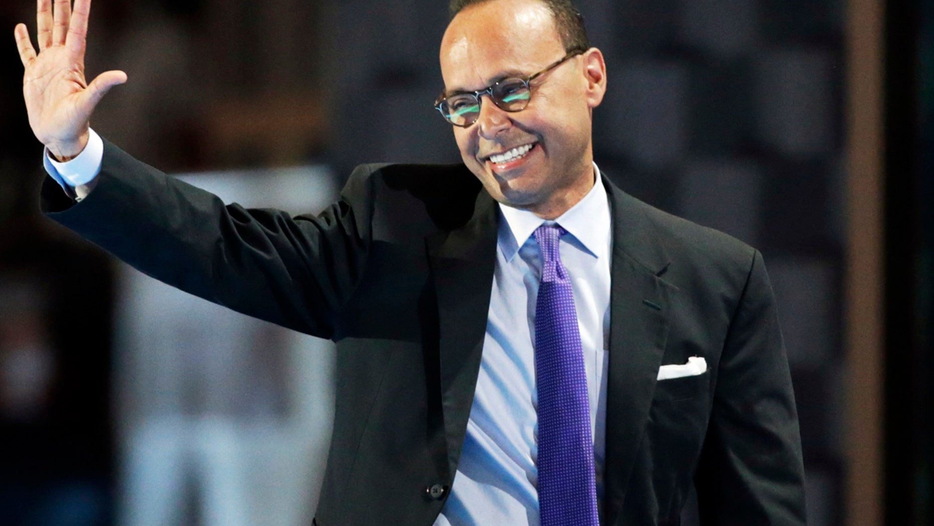 U.S. Rep. Luis Gutierrez, R-Ill, waves after speaking at the Democratic National Convention in Philadelphia in July 2016..