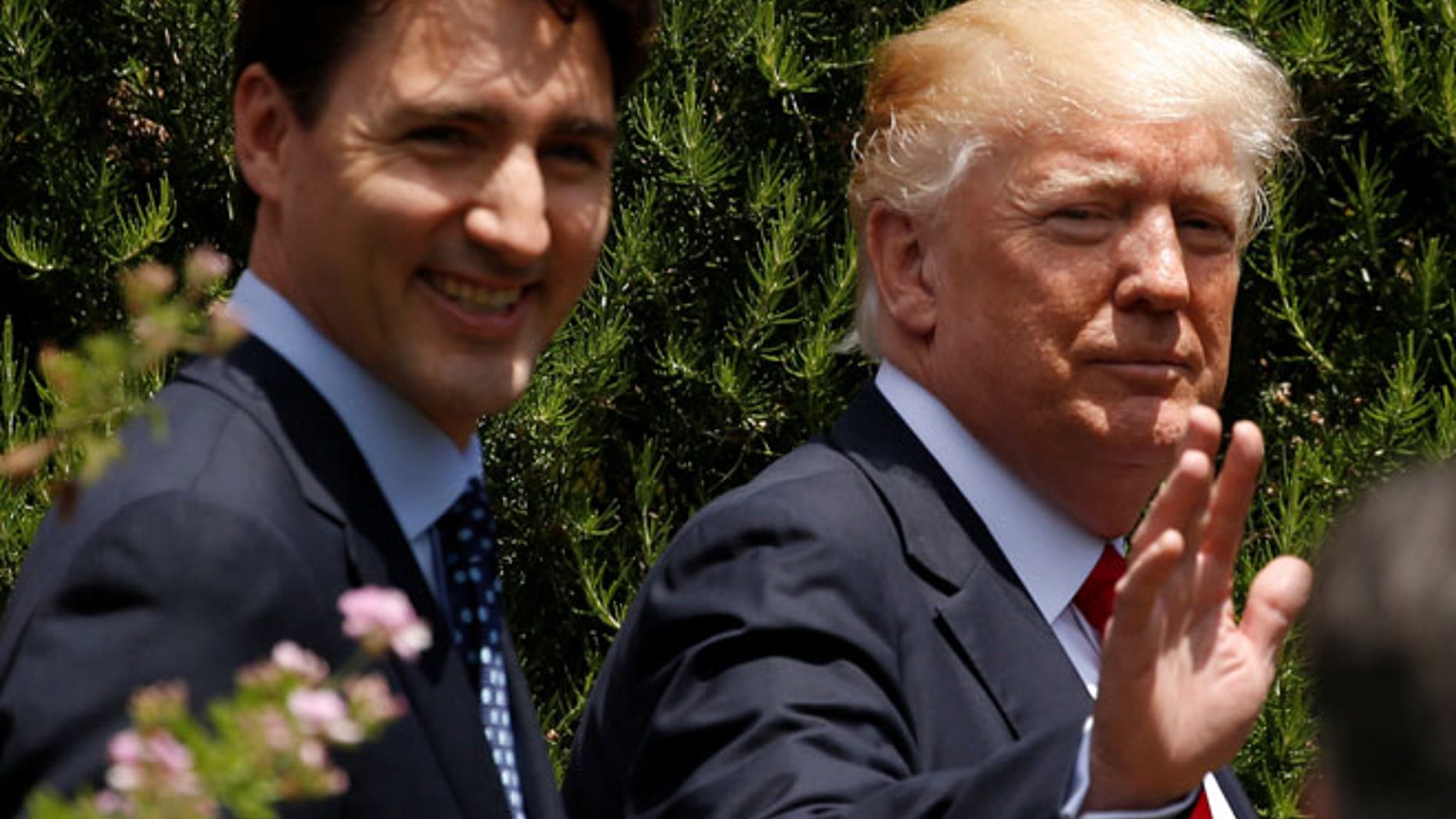 FILE: President Trump and Canadian Prime Minister Trudeau in Taormina, Sicily