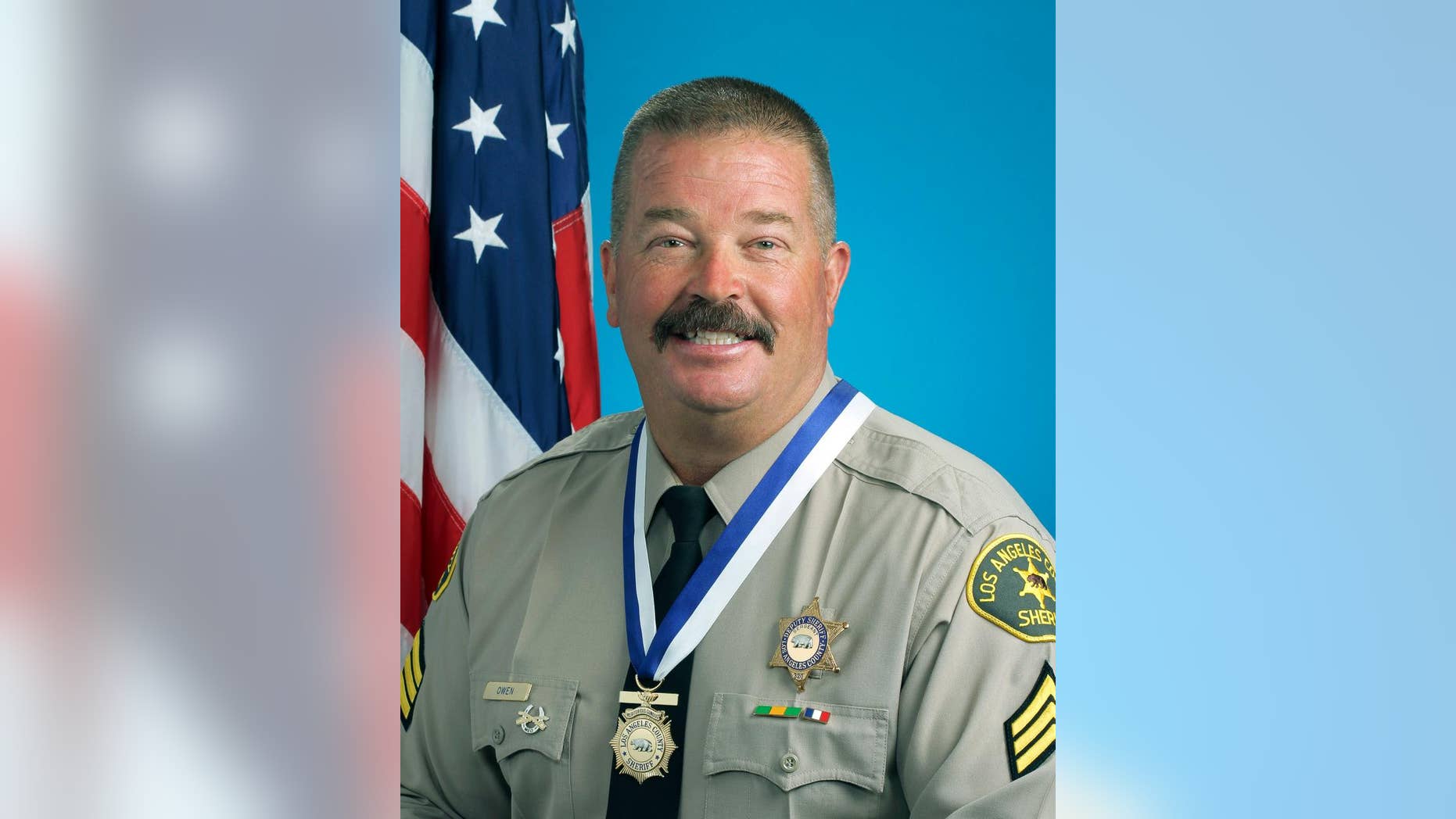 FILE - This Aug. 19, 2014 file photo released by the Los Angeles County Sheriff's Department shows Sgt. Steven Owen. Owen was shot and killed Oct. 5, 2016, while answering a burglary report in Lancaster, Calif. Police motorcycles and cruisers are leading a procession to the memorial service for Owen Thursday morning, Oct. 13. Hundreds of law enforcement personnel are expected to attend along with Owen's family, Gov. Jerry Brown and Attorney General Kamala Harris. (Los Angeles County Sheriff's Department via AP, File)