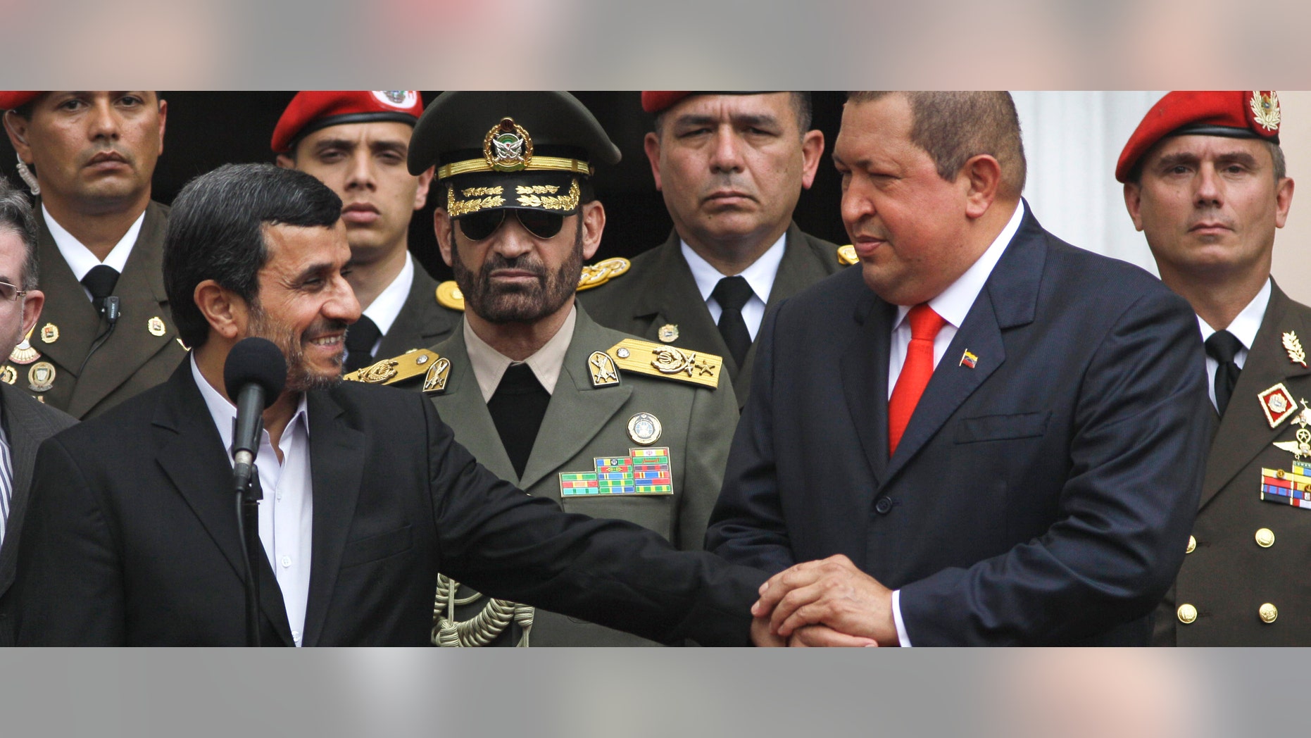 Venezuela's President Hugo Chavez holds the hand of Iran's President Mahmoud Ahmadinejad, left, during a welcoming ceremony at the Miraflores presidential palace in Caracas in January.