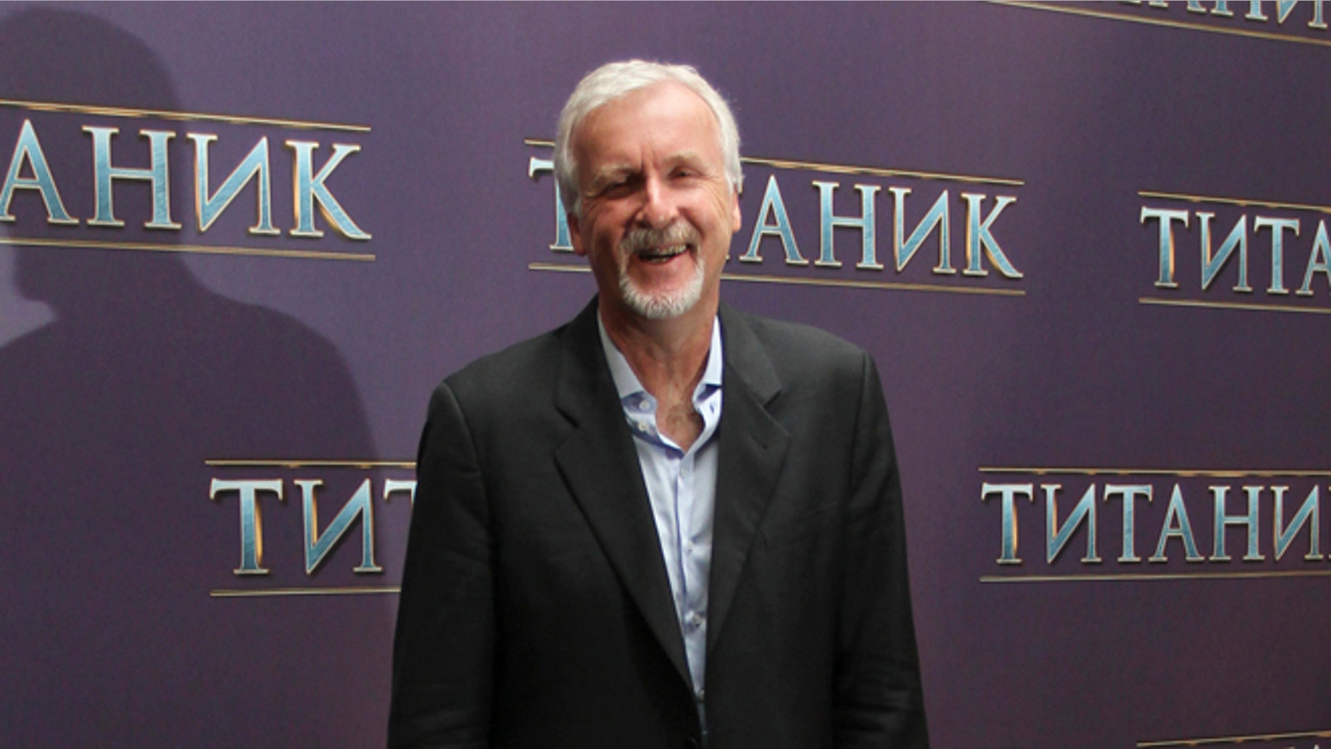 U.S. film director James Cameron poses for a photograph during a presentation for the media in Moscow March 29, 2012. Cameron is visiting the Russian capital to promote his film "Titanic 3D". REUTERS/Ivan Burnyashev (RUSSIA - Tags: ENTERTAINMENT)