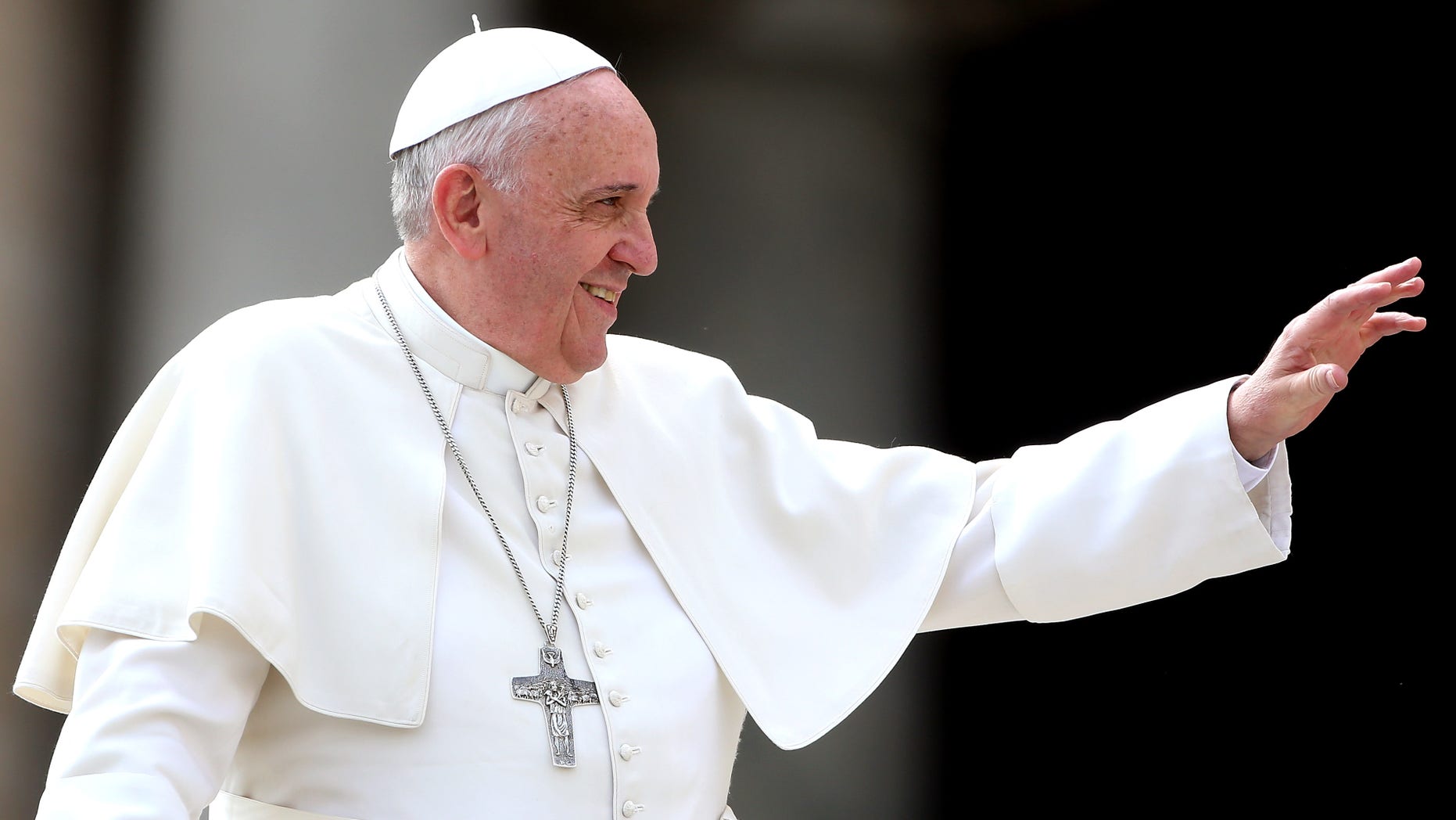VATICAN CITY, VATICAN - MARCH 19: Pope Francis waves to the faithful as he holds his weekly audience in St. Peter's Square on March 19, 2014 in Vatican City, Vatican. Pope Francis celebrated the Feast of St. Joseph by saying the saint is a model for all fathers and educators. (Photo by Franco Origlia/Getty Images)
