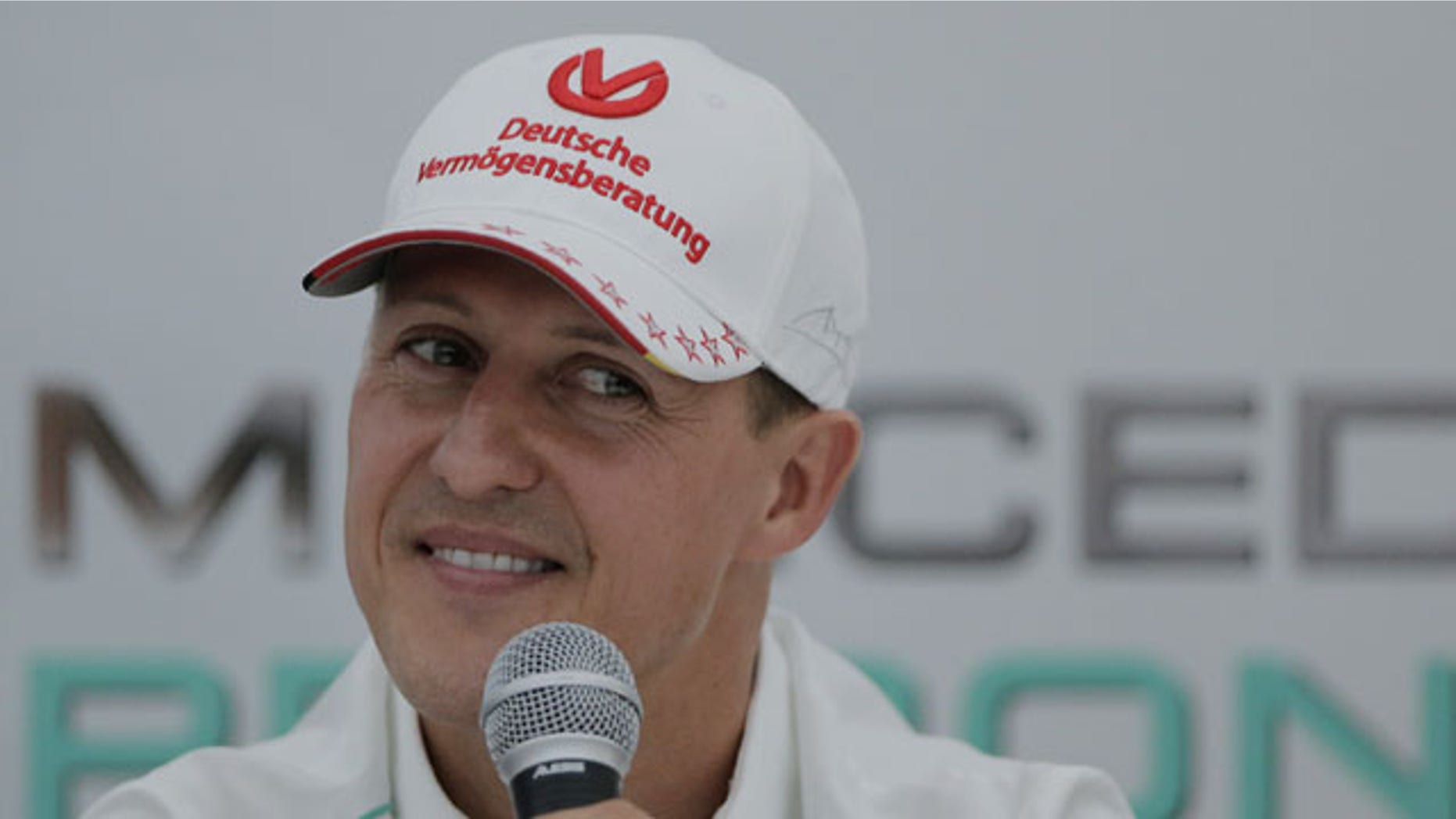 File - Michael Schumacher announces his retirement from Formula One at the end of the 2012 season during a press conference at the Suzuka Circuit venue for the Japanese Formula One Grand Prix in Suzuka, Japan. (AP Photo)