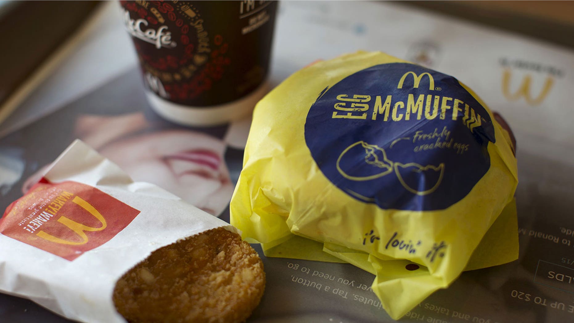 The man reportedly brandished his gun at the drive-thru worker who broke the news.