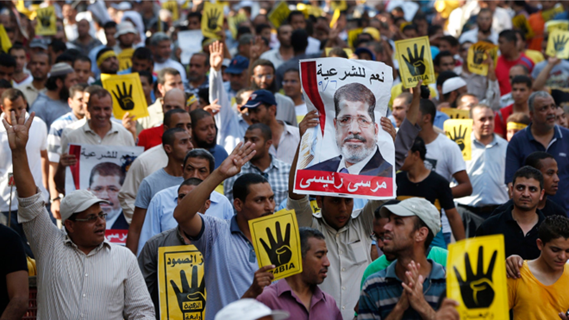Sept. 6, 2013: Supporters of the Muslim Brotherhood march in Cairo, Egypt. Thousands of protesters flowed out of mosques on Friday in Muslim Brotherhood-led rallies against the military-backed government a day after a car bomb in the Egyptian capital marked a substantial escalation in Egypts violent turmoil.