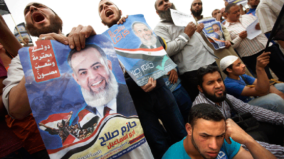 April 18: Followers of Egyptian Muslim cleric and a former candidate for the Egyptian presidency Hazem Abu Ismail protest the disqualification of their leader outside the Presidential Election Committee in Cairo, Egypt.