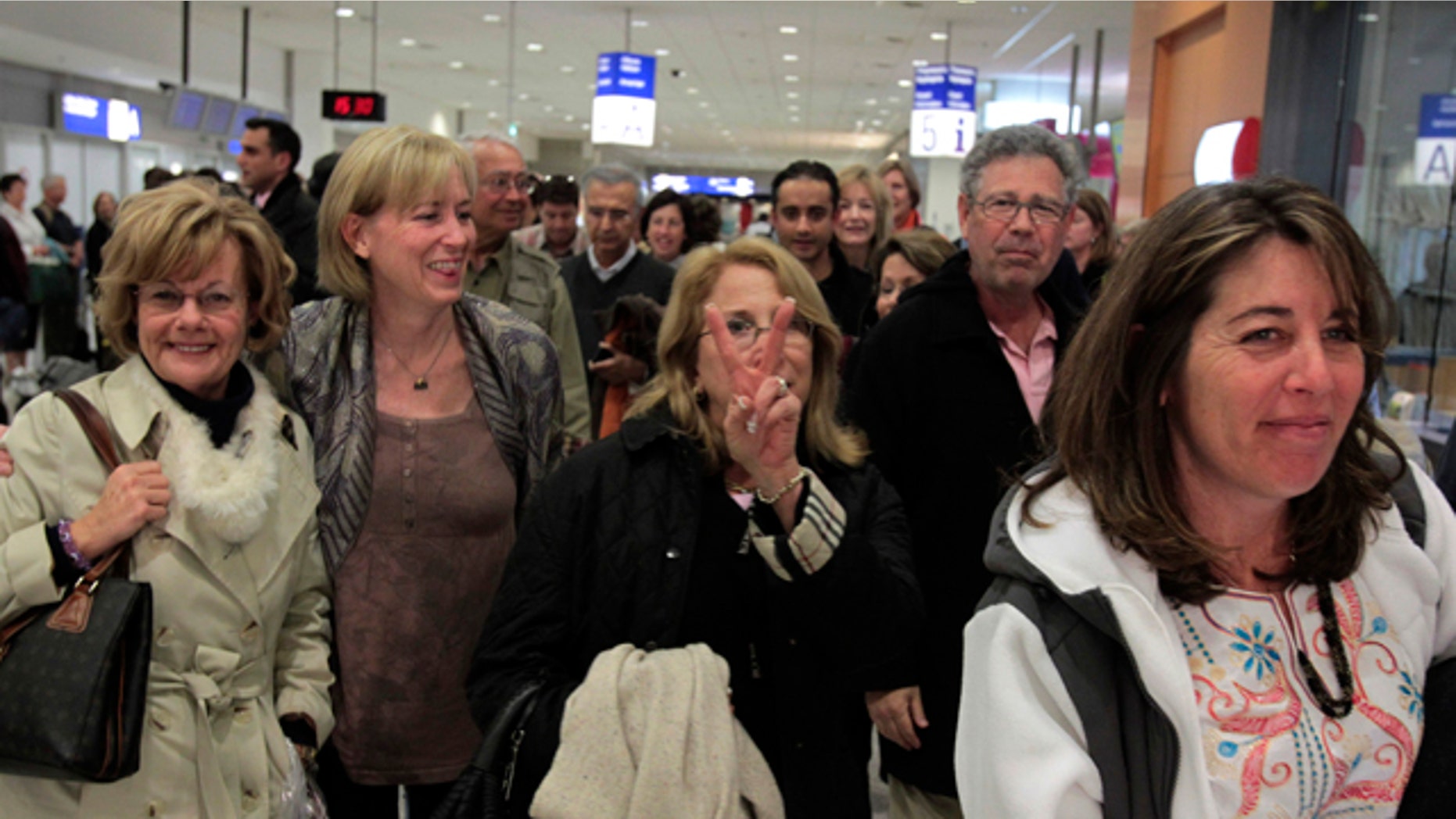 Jan. 31: Tourists from the U.S. arrive at Athens International Airport Eleftherios Venizelos in Spata, near Athens. A tourist group with 65 Americans arrived in Athens as hundreds of foreigners were being evacuated from the unrest in Egypt, with countries scrambling to send planes to fly their citizens out and Cairo's short-staffed international airport a scene of chaos and confusion. (AP)