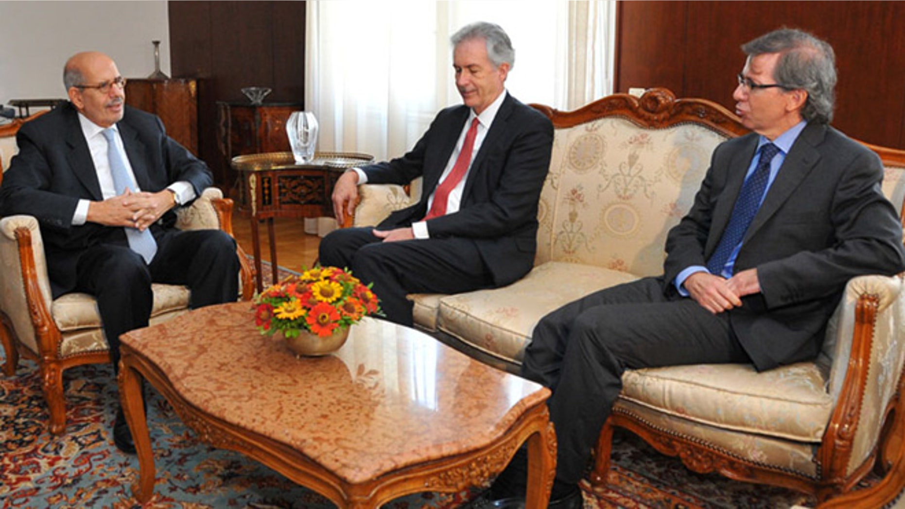 Aug. 6, 2013: This image released by the Egyptian Presidency shows interim Vice President Mohamed Elbaradei, left, meets with U.S. Deputy Secretary of State William Burns, center, in Cairo, Egypt.