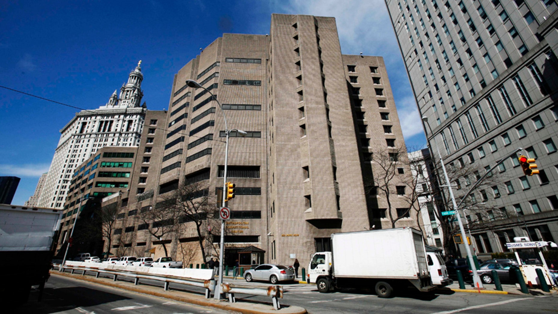 FILE- This March 12, 2009 photo shows the Metropolitan Correctional Center in New York City. The high security section of the facility where high-risk inmates that included Mafia boss John Gotti and several close associates of Osama bin Laden spent their time awaiting trial, will now house accused Mexican drug lord and escape artist Joaquin "El Chapo" Guzman. (AP Photo/Mark Lennihan, File)