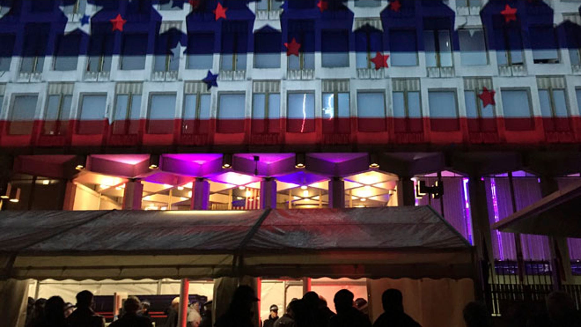People queue outside for an Election Night Party at The United States Embassy, in London, Tuesday, Nov. 8, 2016. The US headed for the polls to vote for their new president. (AP Photo/Frank Augstein)