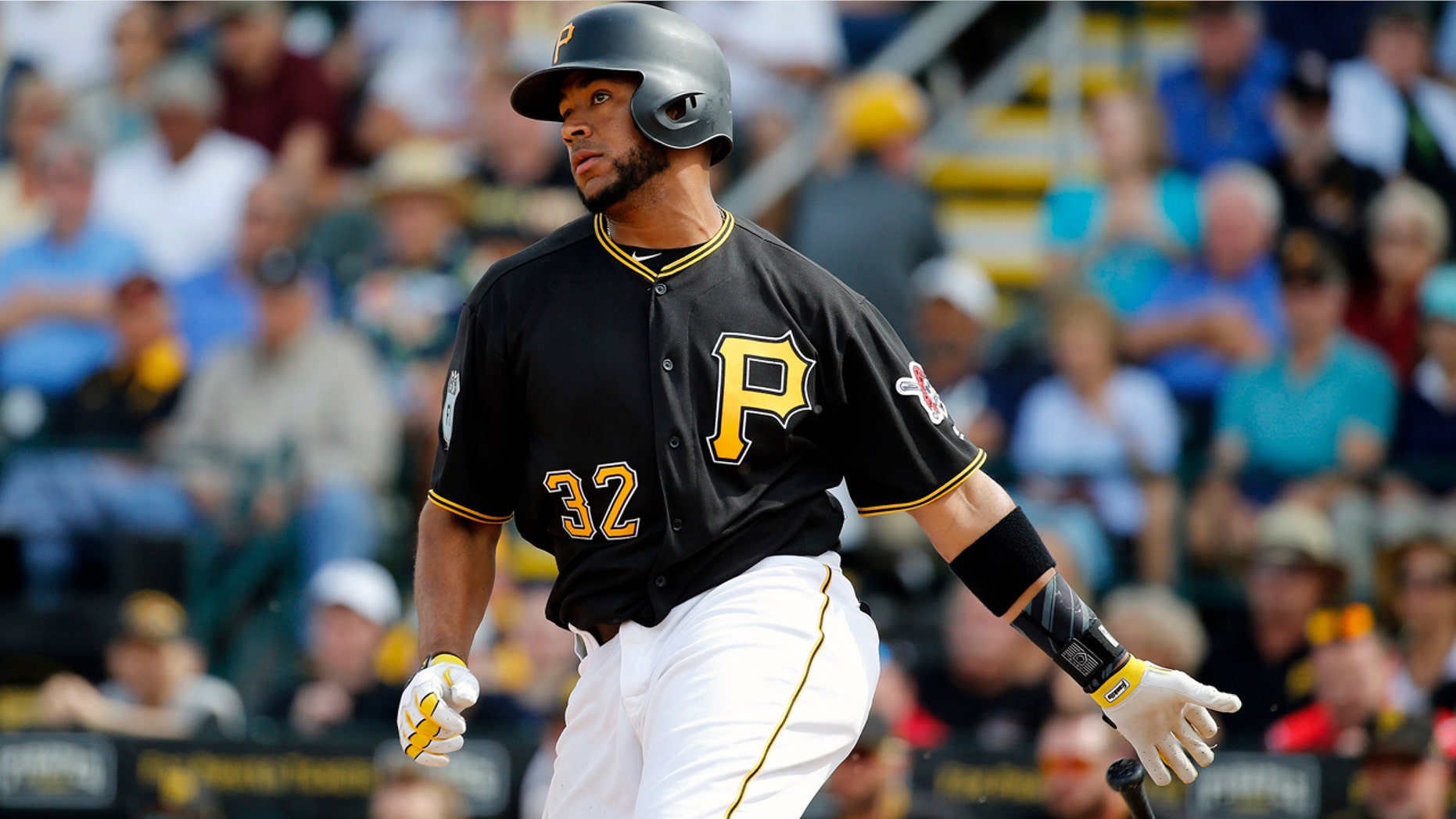 Mar 6, 2017; Bradenton, FL, USA; Pittsburgh Pirates catcher Elias Diaz (32) hits a RBI single during the fifth inning against the New York Yankees at Lecom Park. Mandatory Credit: Kim Klement-USA TODAY Sports - 9922842
