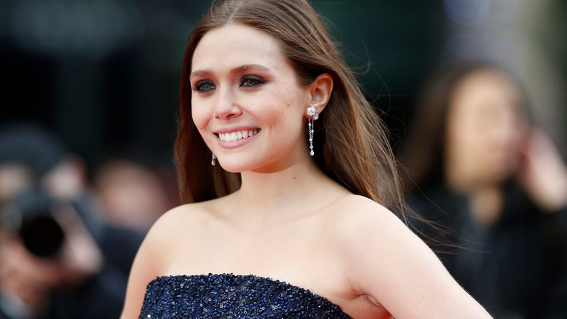 Elizabeth Olsen attends the Godzilla Premiere in central London May 11, 2014.