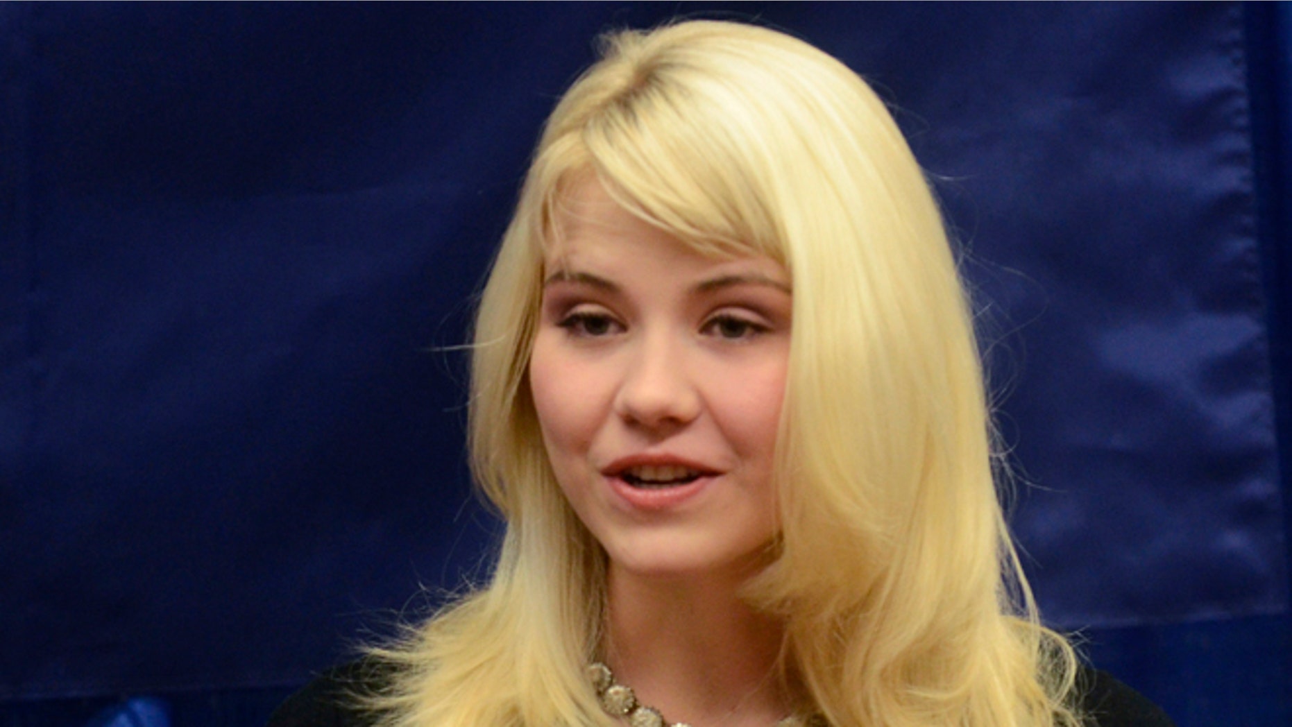 Oct. 30, 2012: In this file photo, Elizabeth Smart speaks to reporters regarding her advocacy of child protection and the healing process she has experienced, prior to her presentation at the Child Sexual Abuse Conference, in State College, Pa.