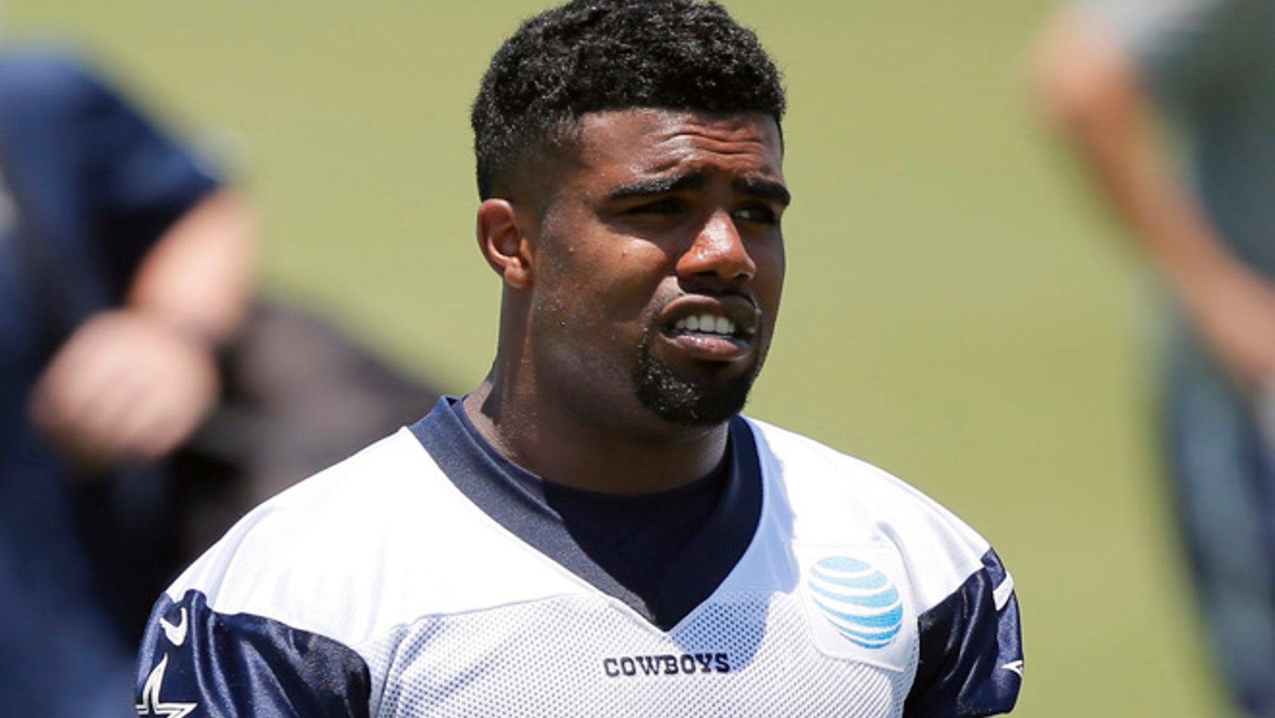 FILE - In this June 8, 2016, file photo, Dallas Cowboys running back Ezekiel Elliott walks off the field after a workout during an NFL football training camp in Irving, Texas. (AP Photo/Tony Gutierrez, File)