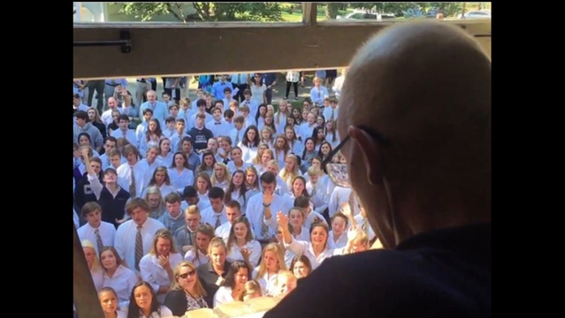 Students arrived at their beloved teacher's home to sing him a special song.