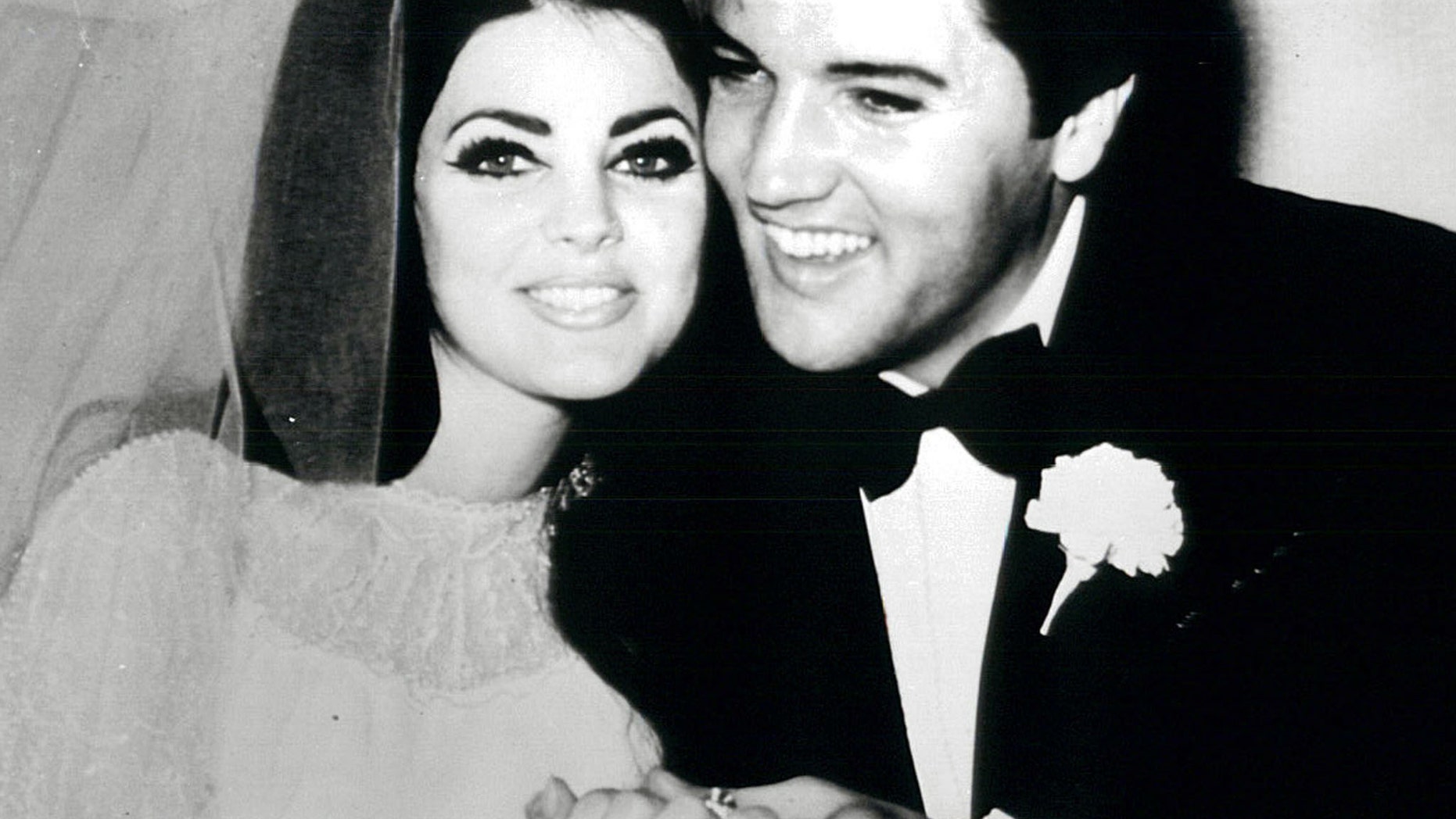 Elvis and Priscilla Presley are pictured after exchanging nuptials in the Aladdin Hotel-Casino in Las Vegas in this 1967 photo.