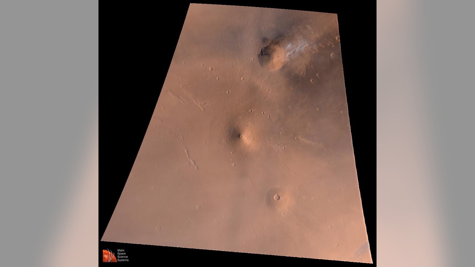 Volcanoes on Mars like Elysium Mons, whose volcanic region is pictured here, grew much slower than their counterparts on Earth, a new study has found.