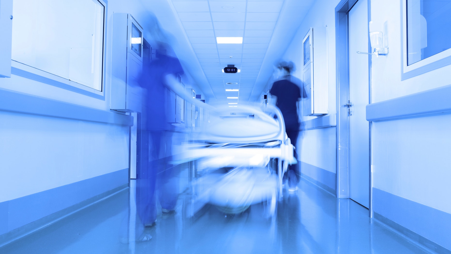 Bed in a modern clinic corridor