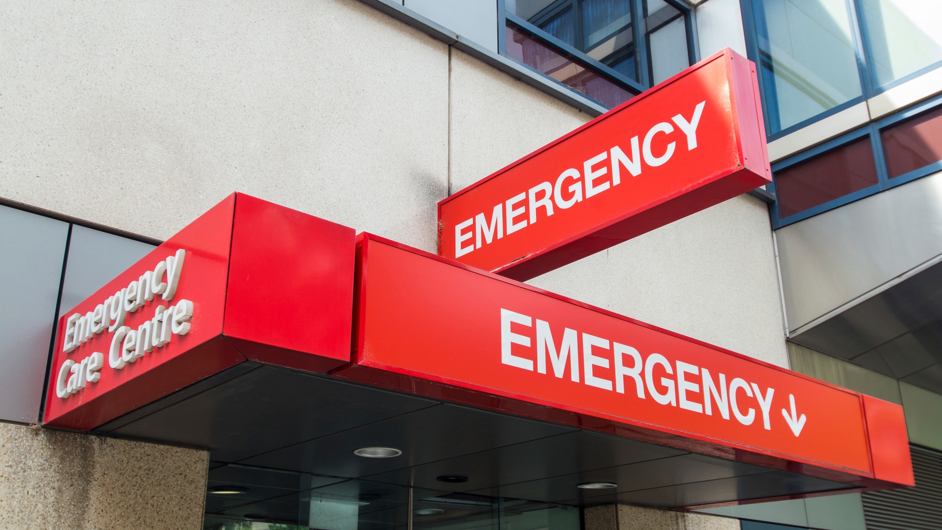 Entrance to hospital emergency department at St Vincent's Hospital in Melbourne, Australia. The sign is red with the word EMERGENCY prominently displayed. It can be used to illustrate various healthcare, medical and emergency concepts, from afflictions such as stroke or heart attack, diseases such as HIV or cancer, and accidents such as road trauma or sporting injury.