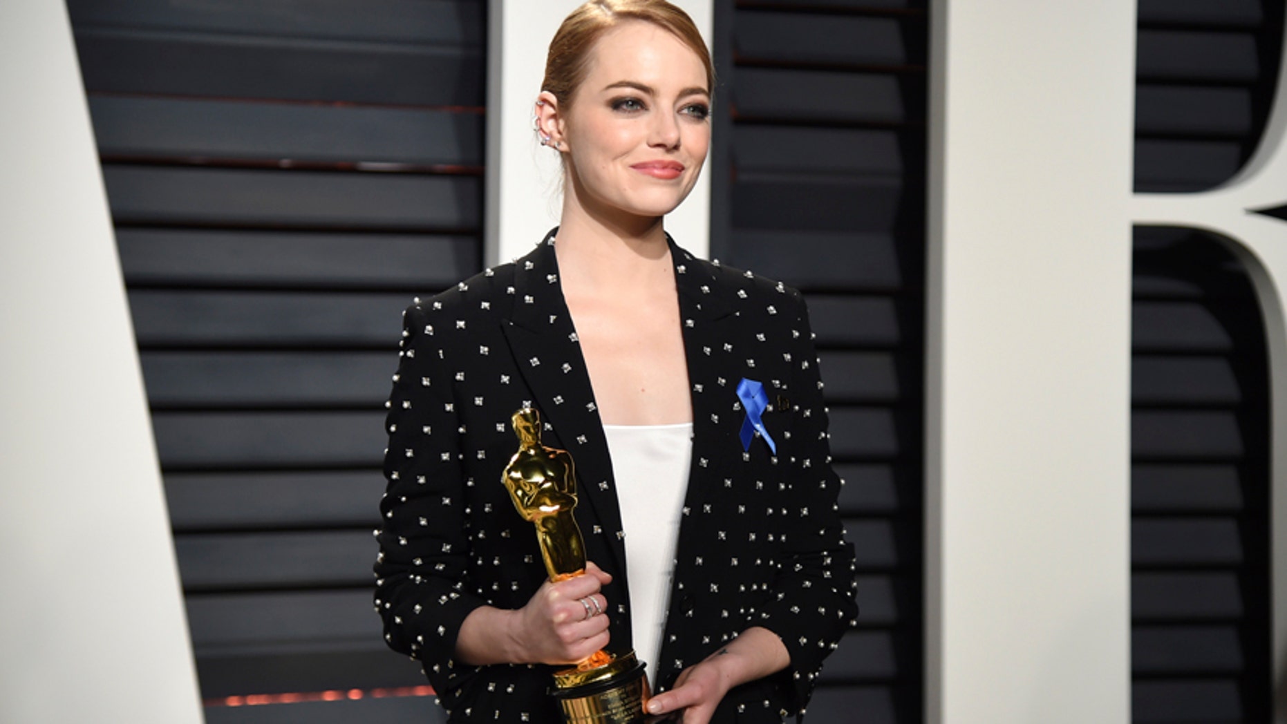 Emma Stone arrives at the Vanity Fair Oscar Party on Monday, Feb. 27, 2017, in Beverly Hills, Calif. (Photo by Evan Agostini/Invision/AP)