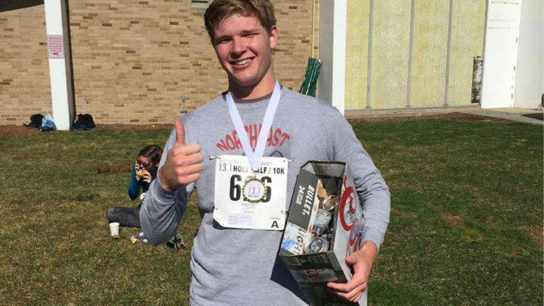 Emmet Farnan, a senior at the University of Notre Dame, finished a Coors Light at every mile marker during a half marathon, as well as one before the race.