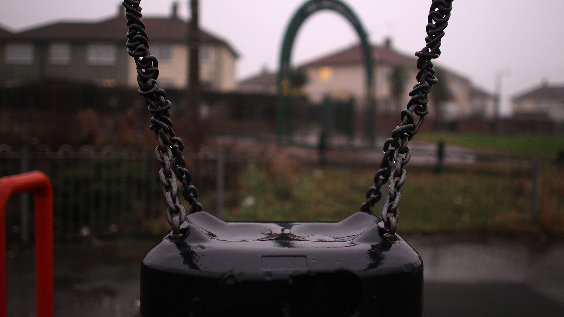 DONCASTER, ENGLAND - JANUARY 22: An empty swing sits in Edlington Recreation play park from where the Edlington torture attack victims were enticed from April. January 22, 2010 in Doncaster, England. The two defendents, who were aged 10 and 11 at the time, were sentenced to an indefinite period of detention today at Sheffield Crown Court. The boys filmed the attack on two younger boys with a mobile phone and left the victims for dead in an area of waste ground in Edlington in Yorkshire last April. (Photo by Christopher Furlong/Getty Images)