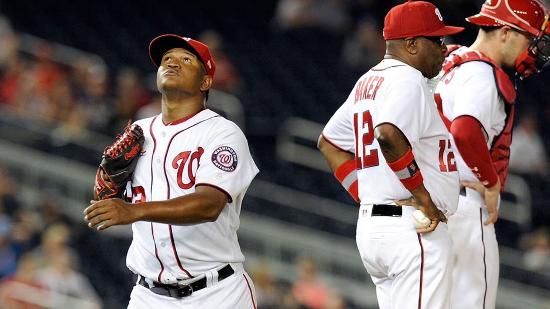 WASHINGTON, DC - JUNE 12: Enny Romero #72 of the Washington Nationals walks to the dugout after being removed from the game in the eighth inning against the Atlanta Braves at Nationals Park on June 12, 2017 in Washington, DC. Atlanta won the game 11-10. (Photo by Greg Fiume/Getty Images)