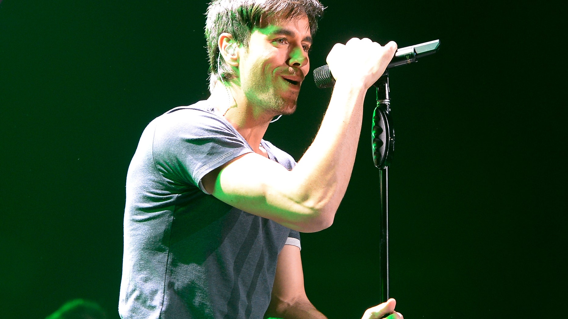 December 6, 2013. Enrique Iglesias performs during KIIS FM's Jingle Ball concert at the Staples Center in Los Angeles, California.