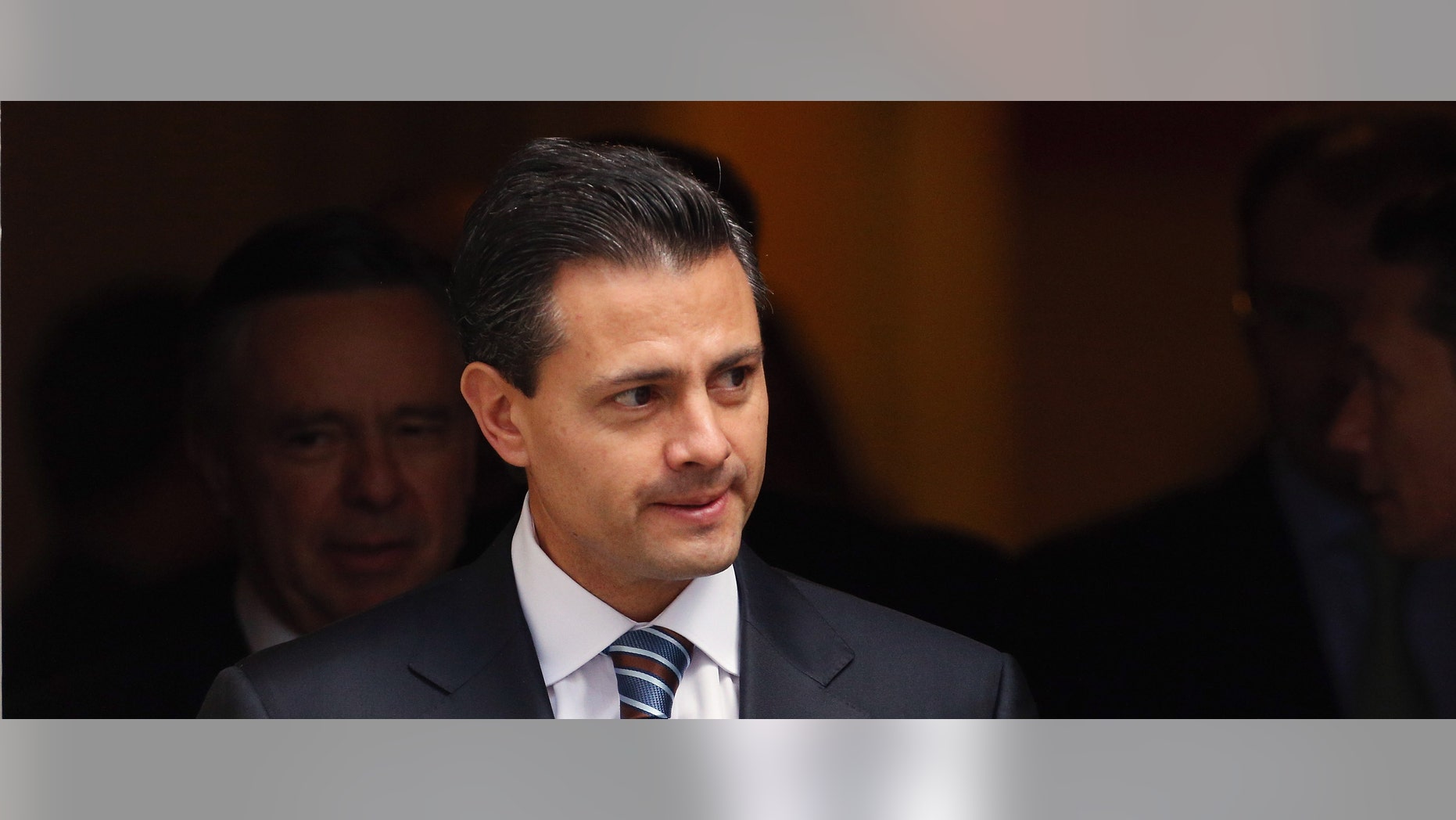 LONDON, ENGLAND - OCTOBER 16: Mexican President-elect Enrique Pena Nieto leaves Number 10 Downing Street after meeting with British Prime Minister David Cameron on October 16, 2012 in London, England. (Photo by Oli Scarff/Getty Images)