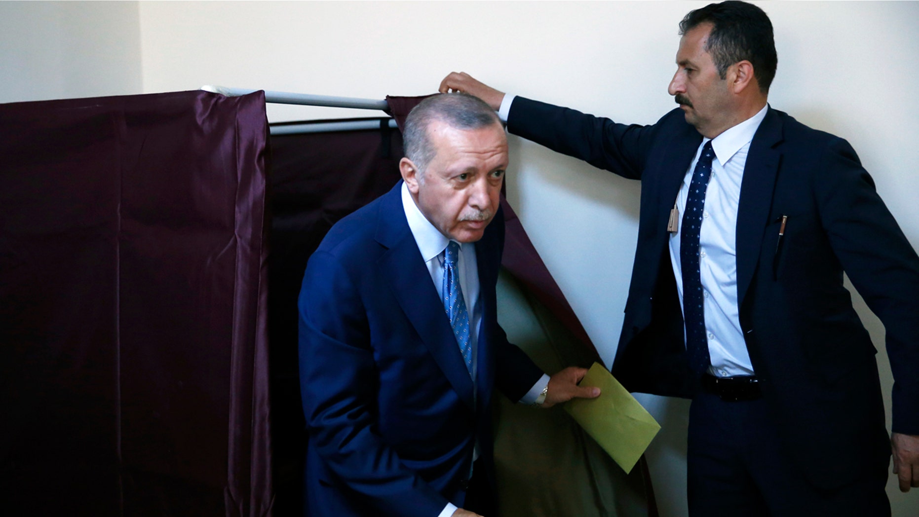 Turkey's President Recep Tayyip Erdogan cast his ballot in Istanbul Sunday.