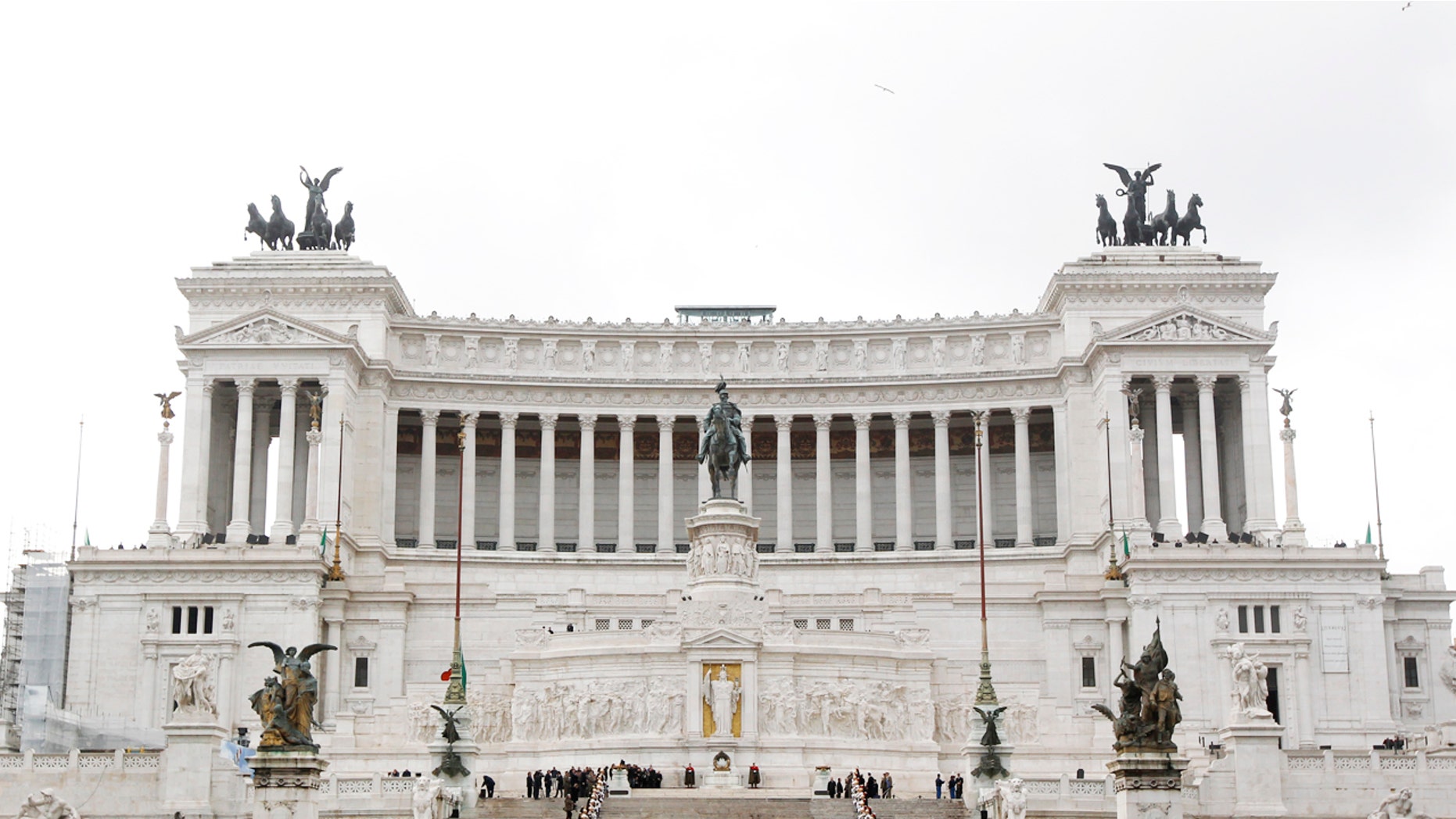 The droopy-branched tree stands in the center of the city at Piazza Venezia.