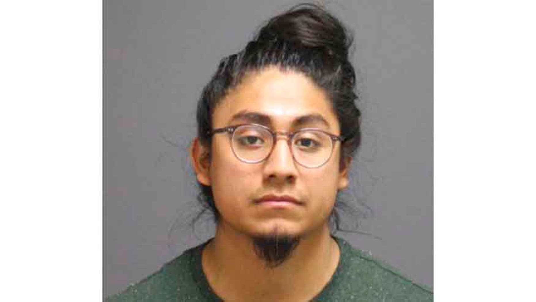 This undated photo provided by UConn Police Department via the Hartford Courant shows Eric Cruz Lopez.