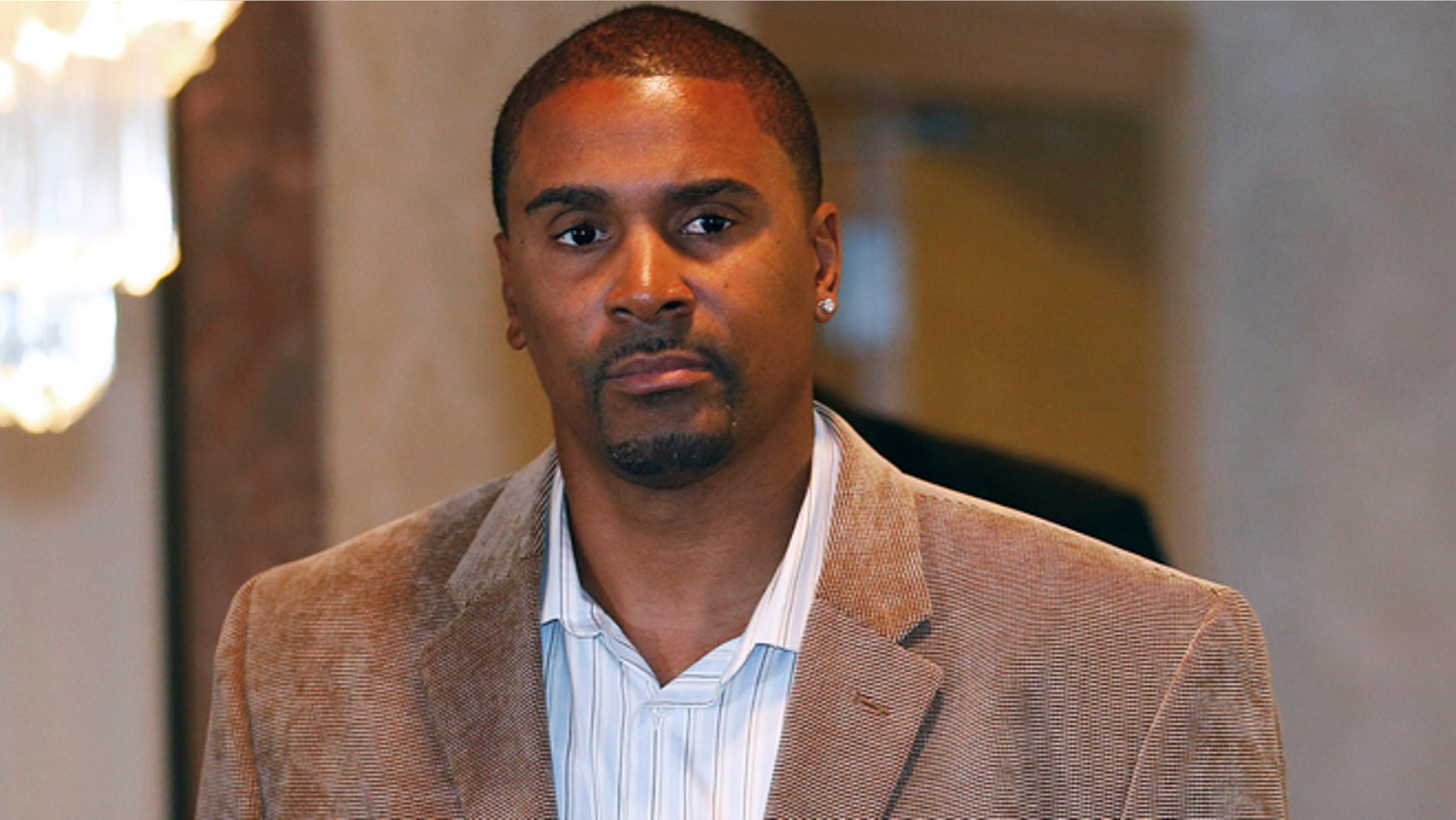 April 5, 2013: Eric Murdock arrives for a news conference in East Hanover, N.J., Friday. Murdock, a former Rutgers employee who made public the video that led to the basketball coach's dismissal and athletic director's resignation, has filed a whistleblower lawsuit against the university. Murdock filed the lawsuit Friday in state court, claiming the university violated the state's employee protection act and his contract.