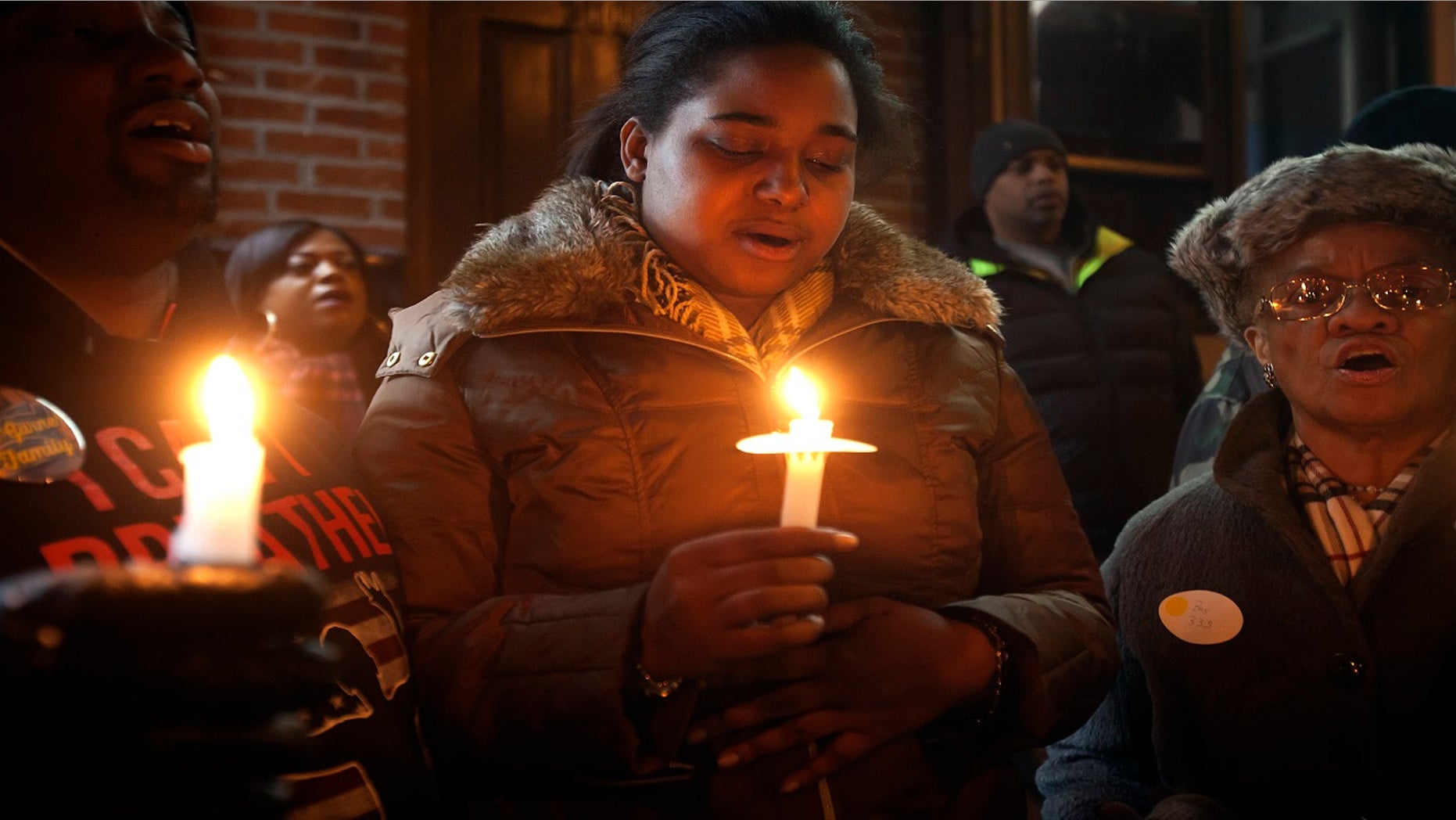 Erica Garner, pictured here in January 2015, has been in a medically induced coma since Saturday, after suffering a heart attack.