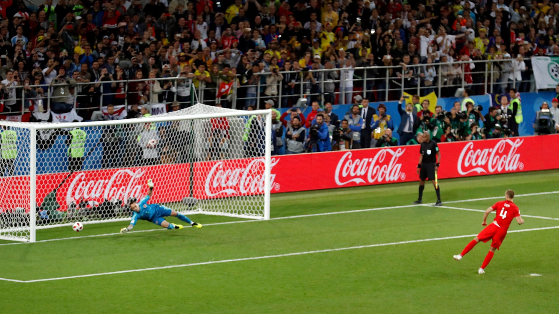England's Eric Dier scores the winning penalty past Colombia's David Ospina in the World Cup last 16 match at Spartak Stadium, Moscow.