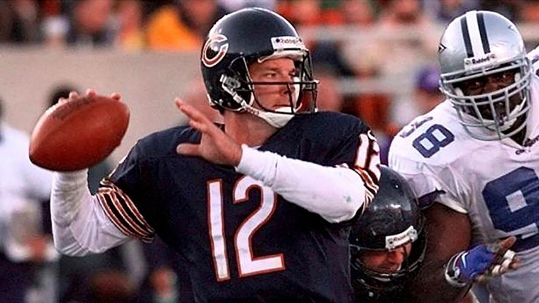 Former NFL quarterback Erik Kramer was charged with misdemeanor battery against his wife after a June incident at their home.