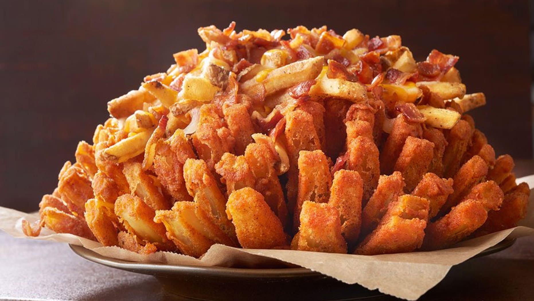 Outback Steakhouse Unveils 2 300 Calorie Bloomin Onion Topped With We Re No Stranger To Rounding Up Insanely Unhealthy Menu Items At Chain Restaurants And Outback Steakhouse S Legendary Bloomin Onion An Entire Colossal