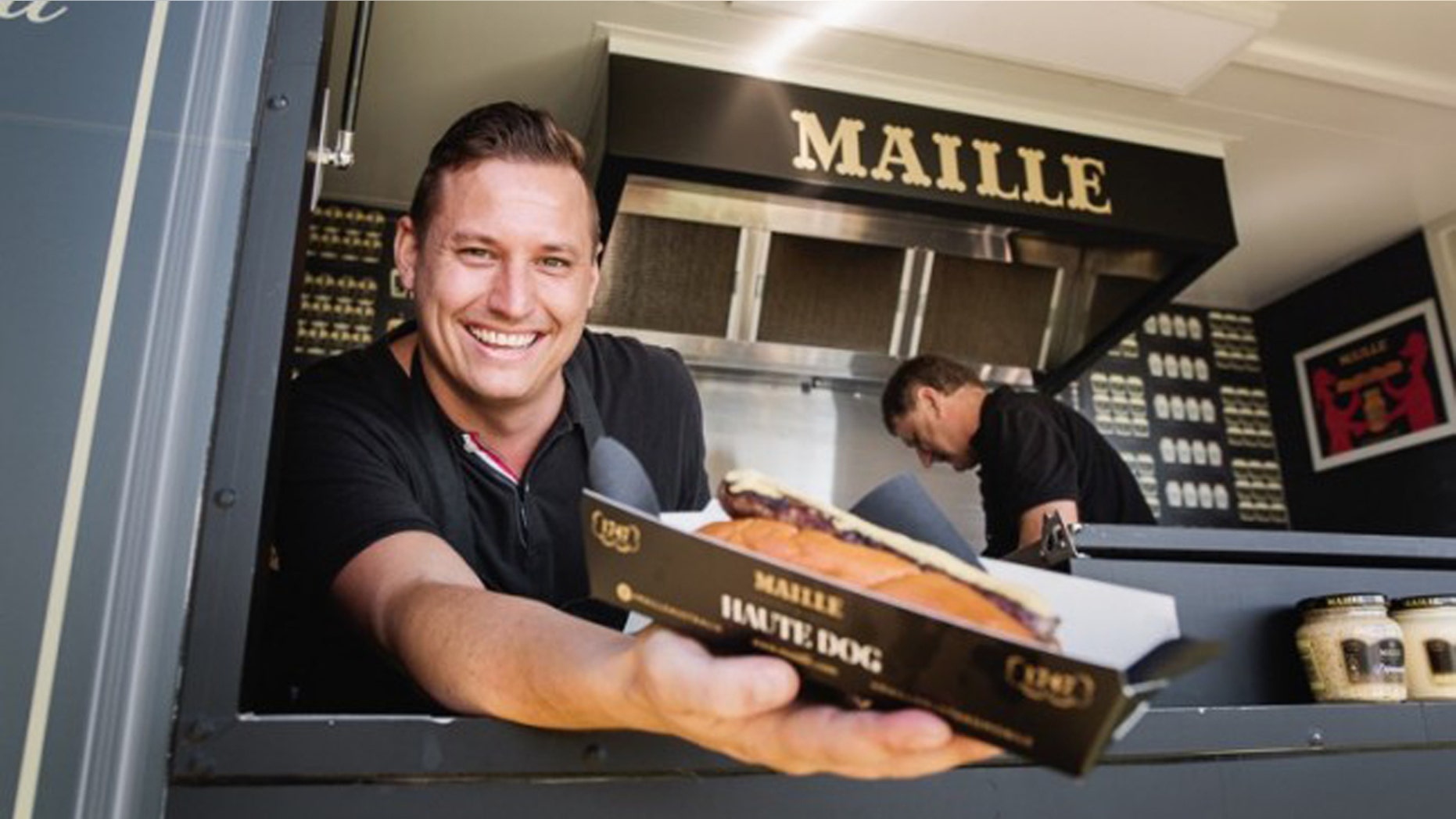 This $100 "haute dog" is topped with just one condiment: truffle-infused mustard.