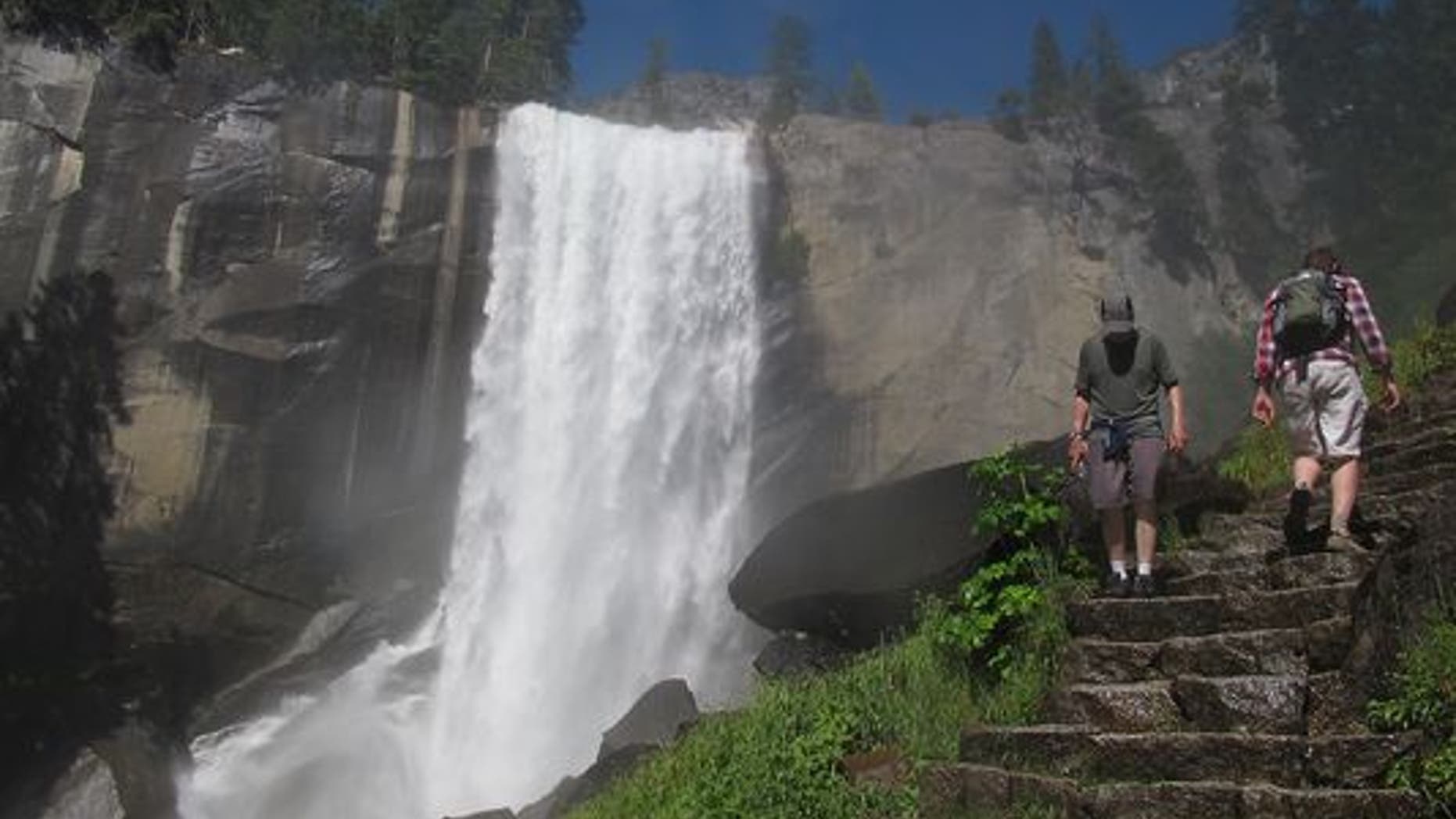 Hikers take on the Mist Trail towards Vernal Falls.