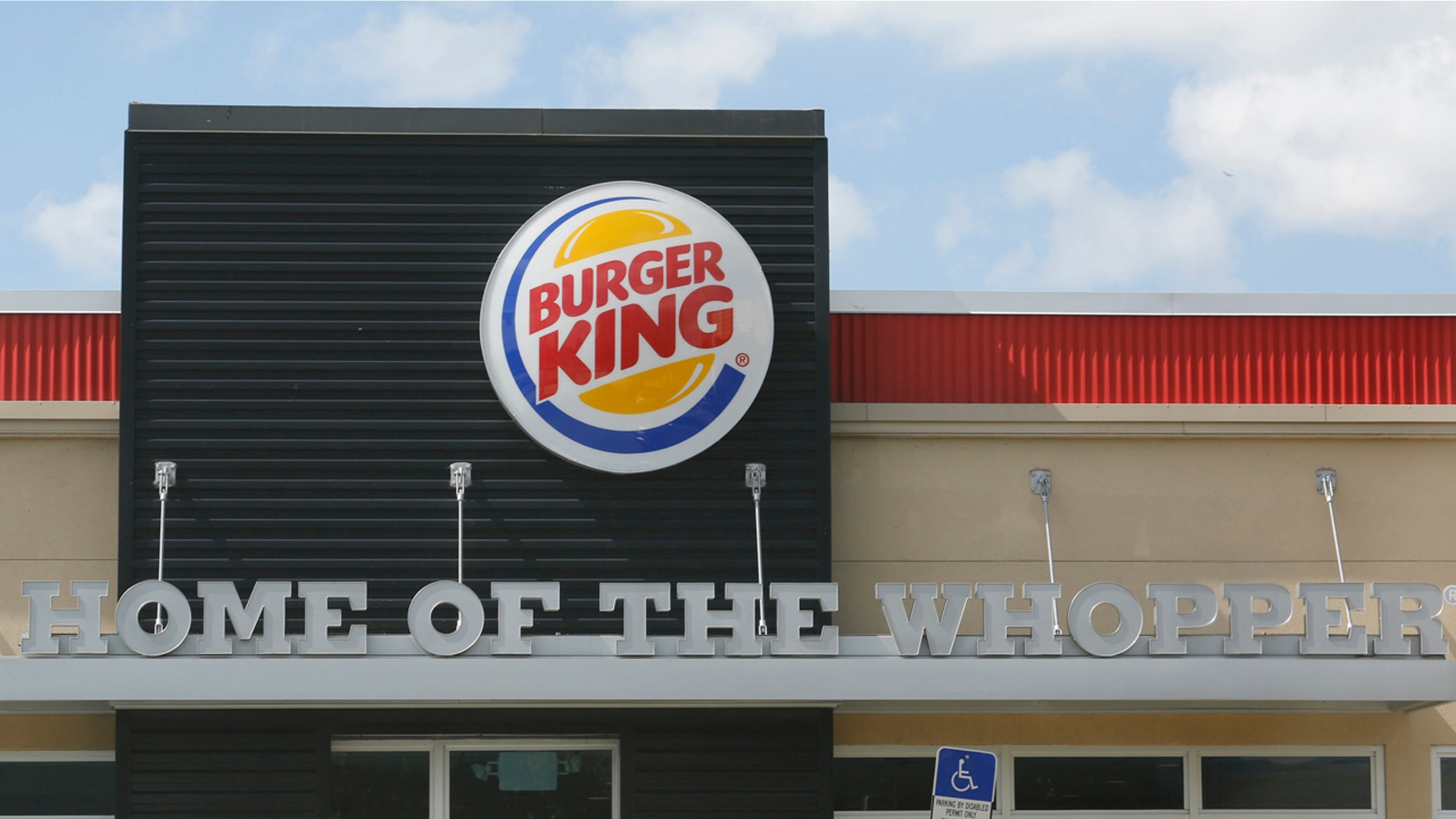 The sign on a Burger King restaurant is shown in Miami, Florida October 28, 2013. Picture taken October 28, 2013. REUTERS/Joe Skipper (UNITED STATES - Tags: BUSINESS LOGO) - RTX14WPW