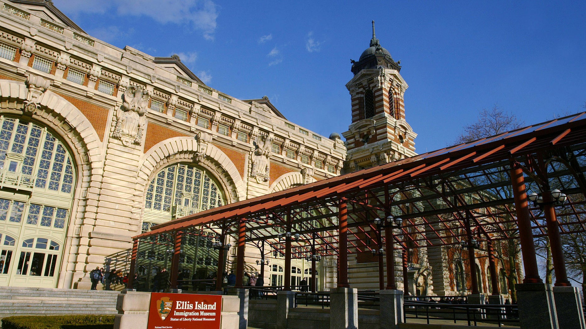 - PHOTO TAKEN 02DEC04 - The entrance to Ellis Island in New York is seen on December 2 ,2004. The Save Ellis Island Foundation launched a campaign December 13, 2004 to raise $300 million to restore 30 historic buildings on the island where over 12 million emigrants first set foot on U.S. soil. Restoration work done in the 1980s led to the island's main building being turned into the Ellis Island Immigration Museum in 1990 which has drawn more than 21 million visitors. But the buildings on the south side of the 27-acre (11-hectare) island continued to deteriorate, including the main hospital complex and a wing where immigrants with contagious diseases were quarantined. Ellis Island served as New York's immigration center from 1892 to 1954. Picture taken December 2, 2004. - RTXN3WT