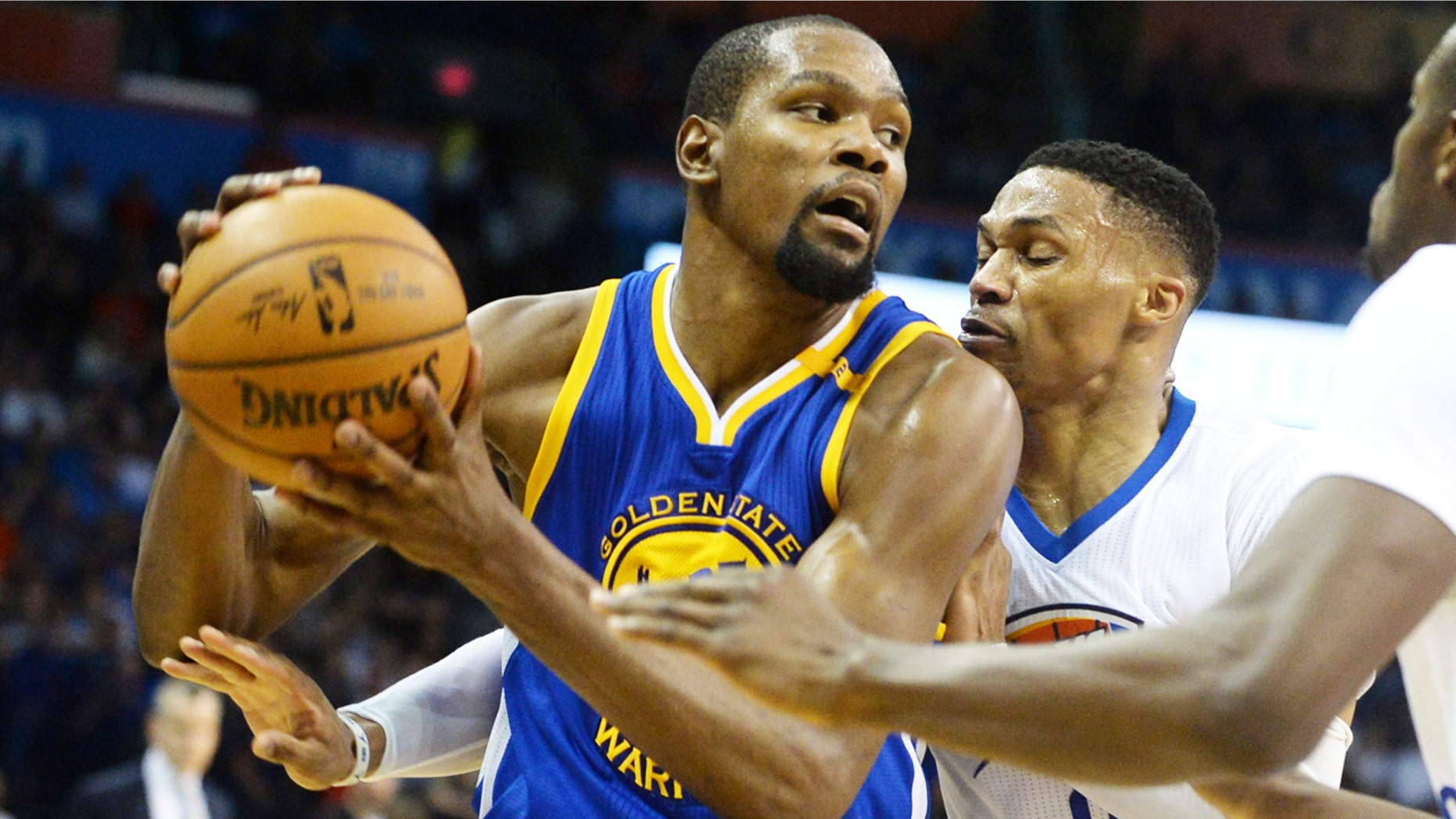 Basketball player Kevin Durant, formally with The Oklahoma City Thunder, now plays for the Golden State Warriors.