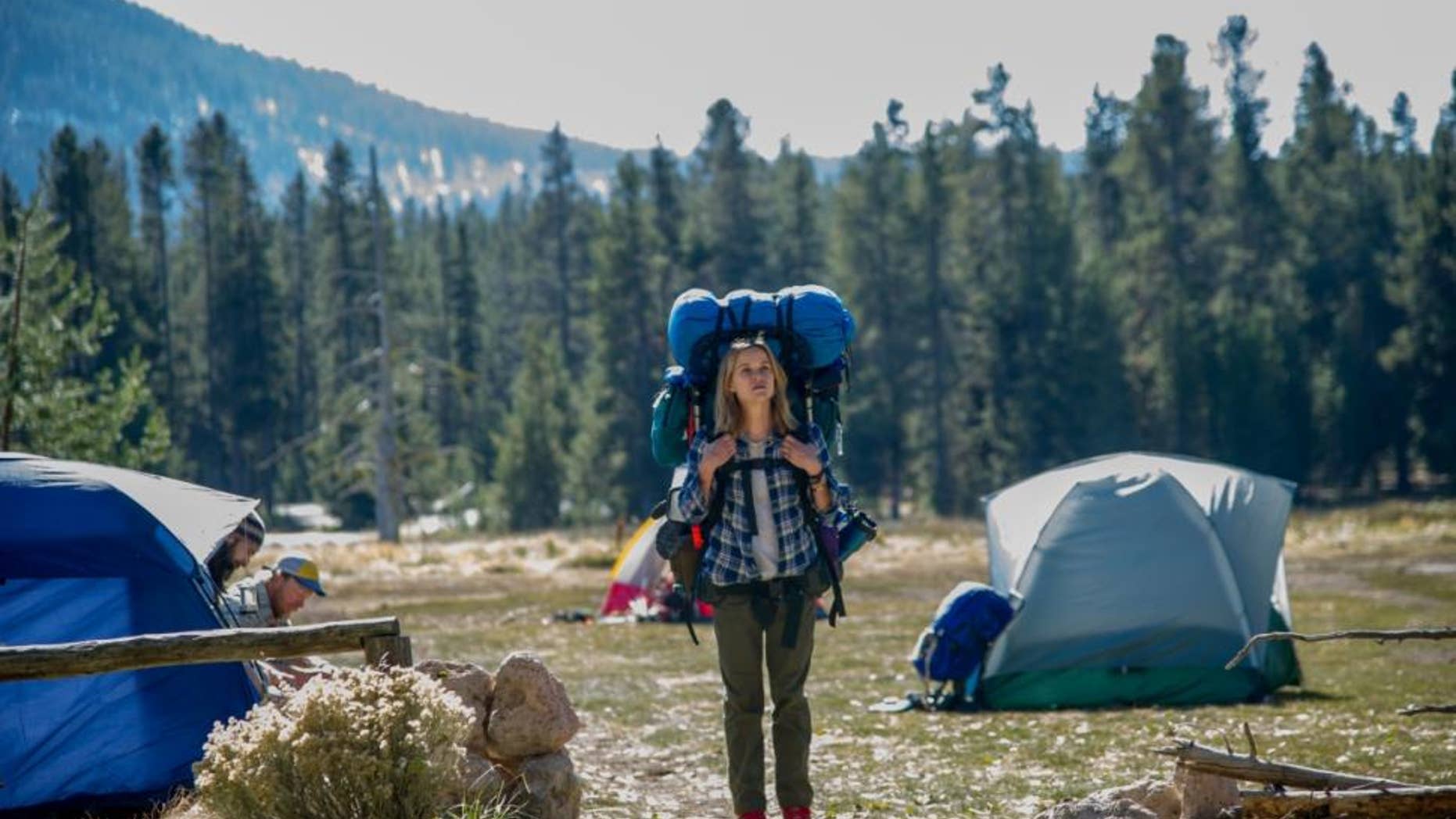 This image released by Fox Searchlight Pictures shows Reese Witherspoon in a scene from the film, "Wild." The movie “Wild,” which is based on the book by author, Cheryl Strayed, has received Oscar nominations for best actress for Witherspoon and best supporting actress, for Laura Dern.