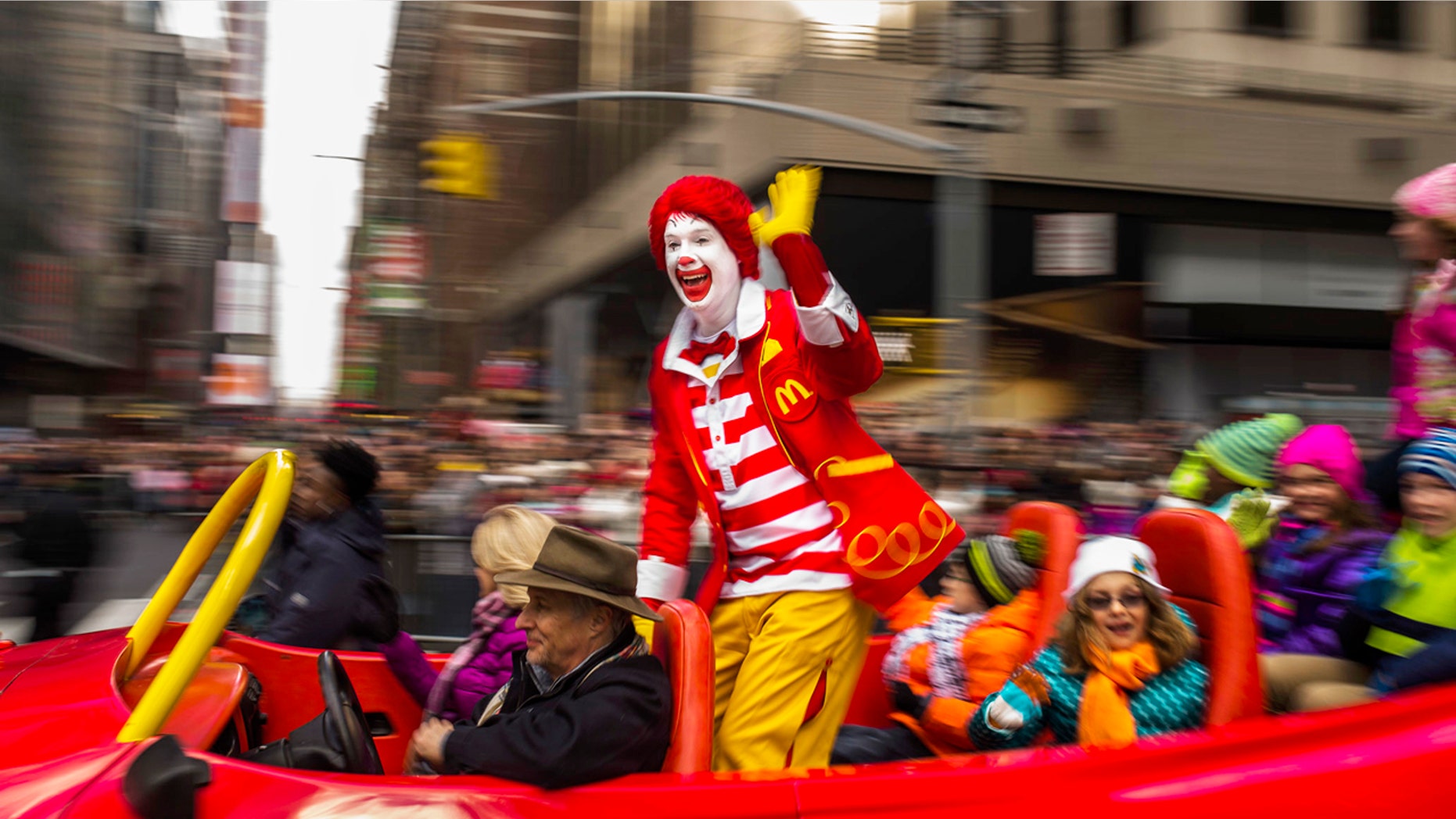 Ronald McDonald waves to the crowd during the Macy's Thanksgiving Day Parade, Thursday, Nov. 26, 2015, in New York City.